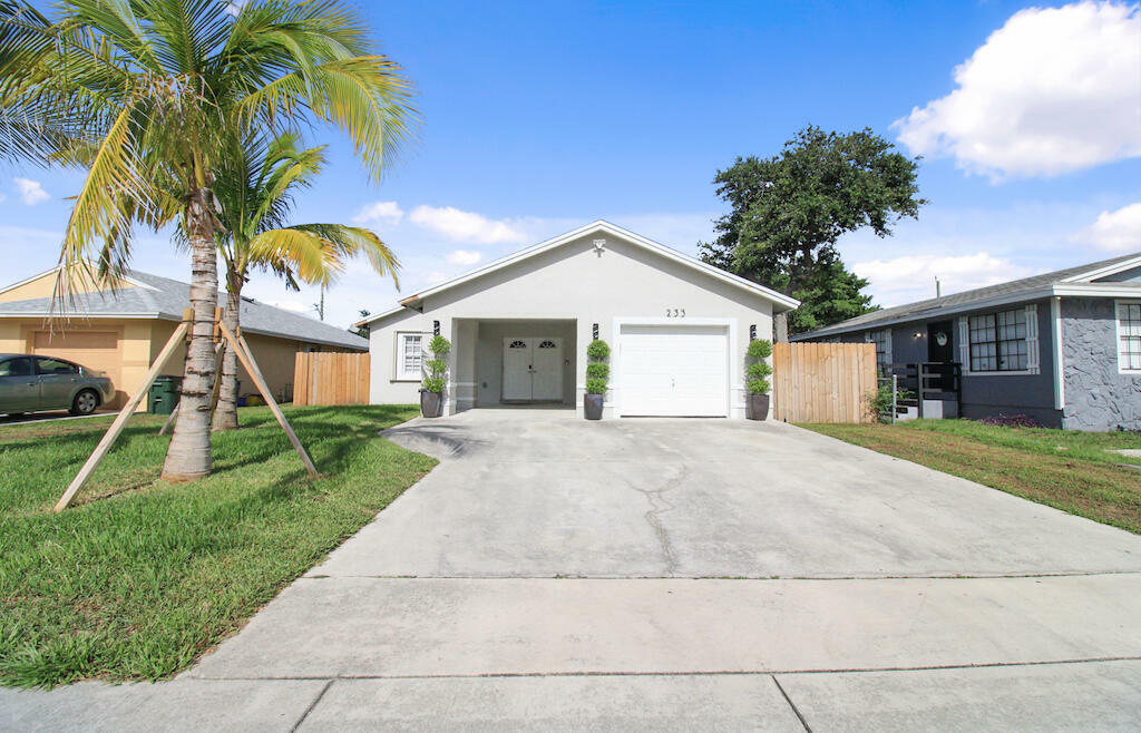 Property Photo:  233 SW 11th Avenue  FL 33444 