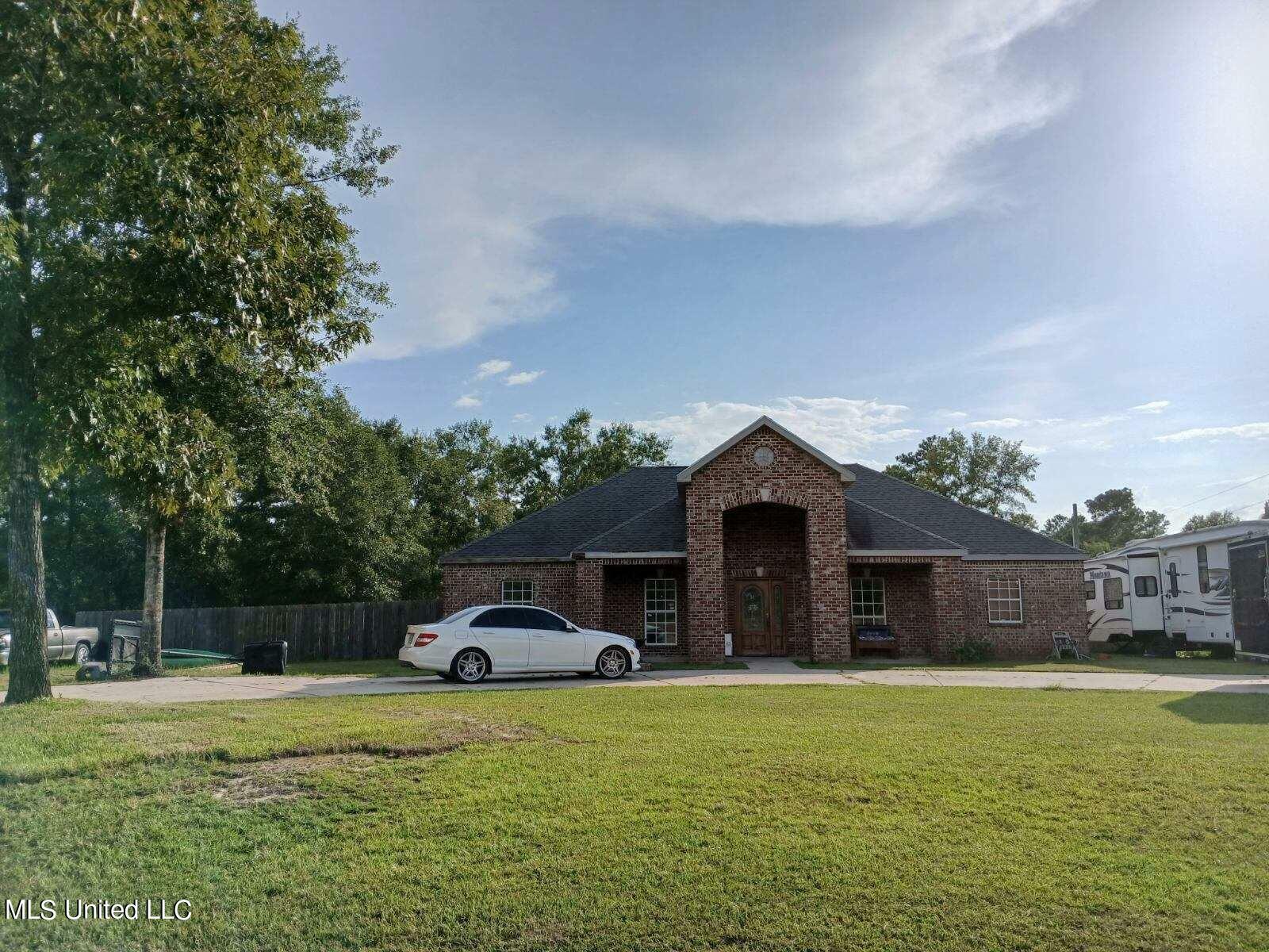 Property Photo:  318 W McHenry Road  MS 39573 