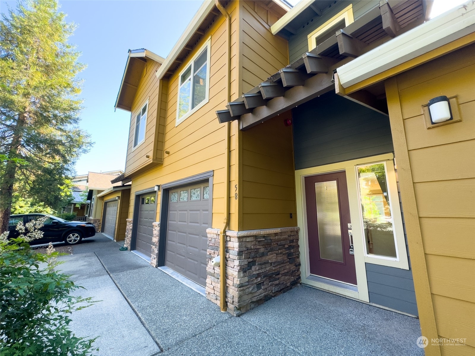 Property Photo:  58 Cougar Ridge Road NW 2203  WA 98027 