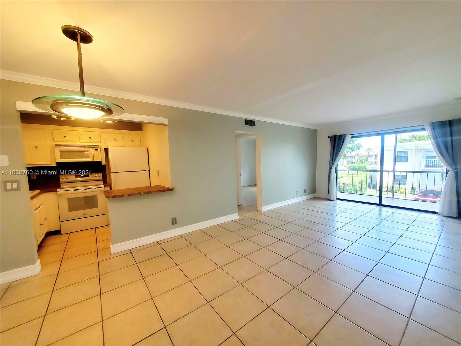 Property Photo:  170 Cypress Club Dr 736  FL 33060 