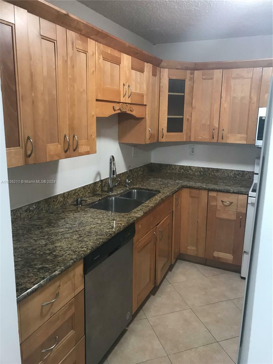 Property Photo:  4394 NW 9th Ave 21-3C  FL 33064 