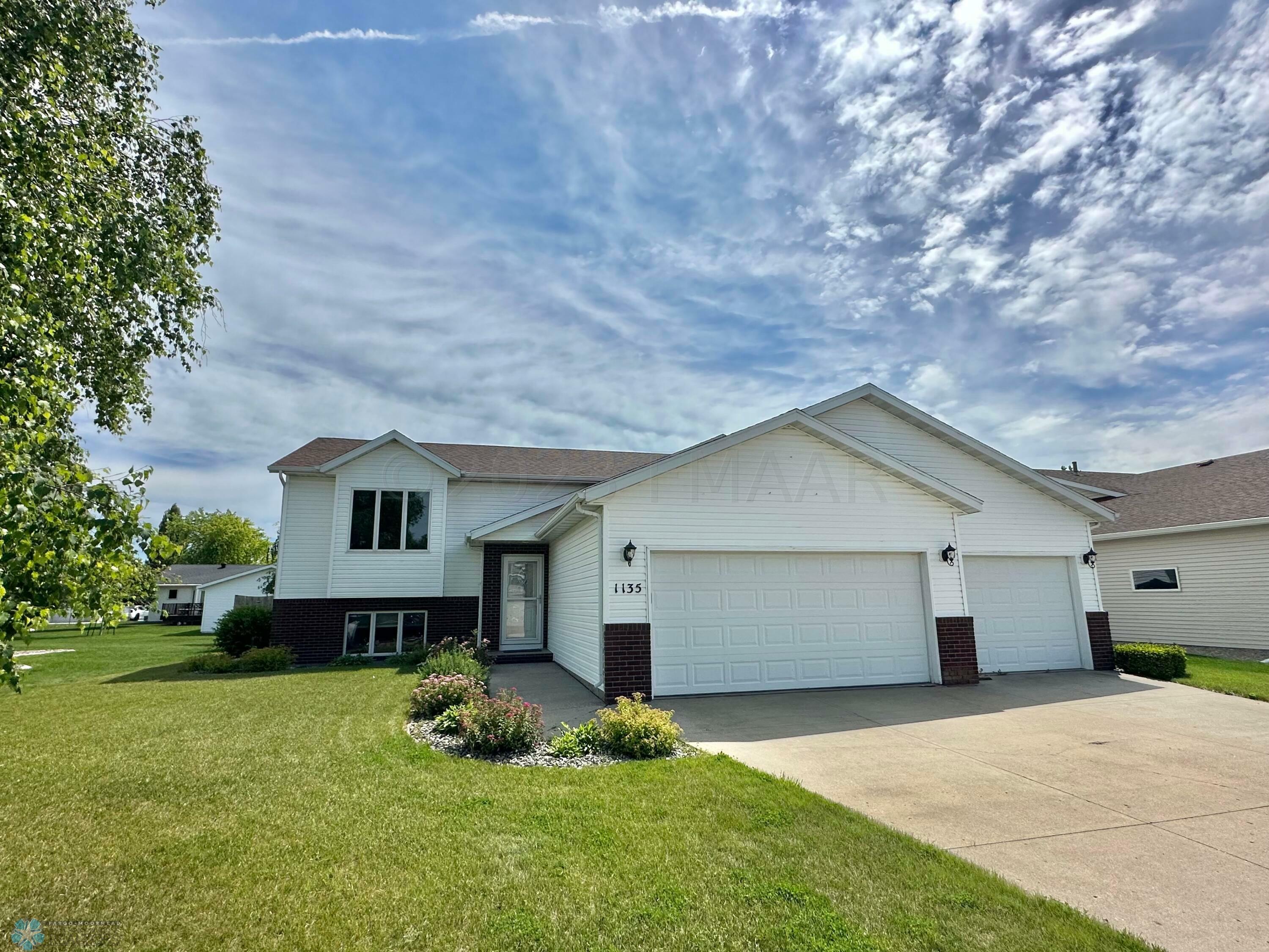 Property Photo:  1135 6th Avenue W  ND 58078 