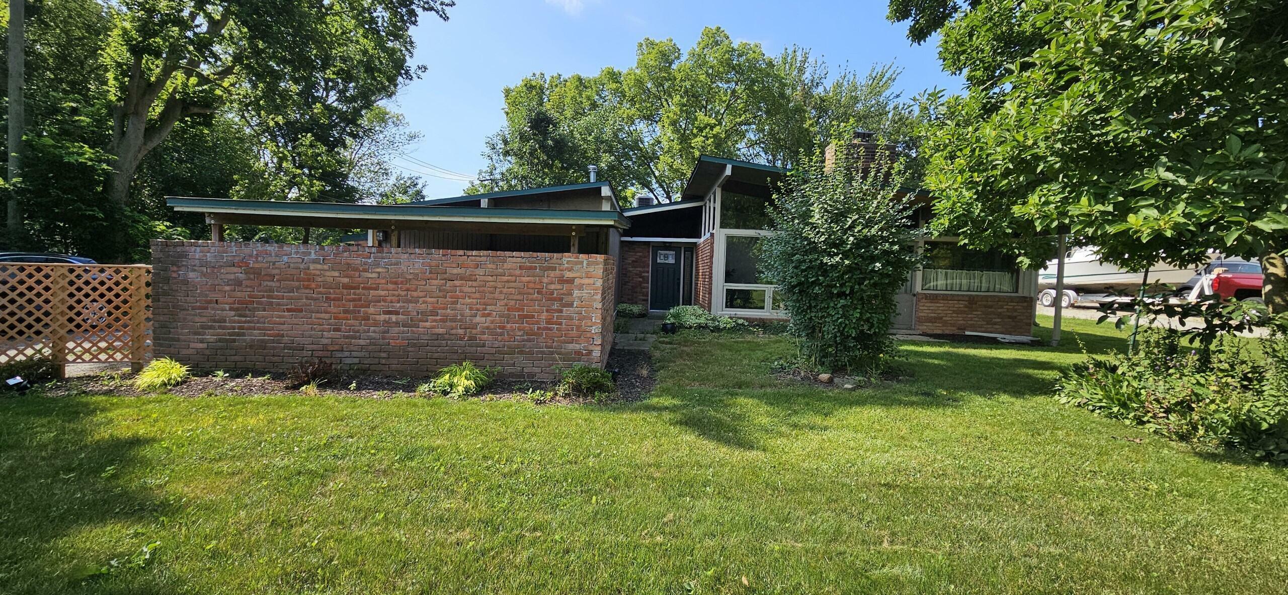 Property Photo:  8355 Rucker Road  MI 48138 