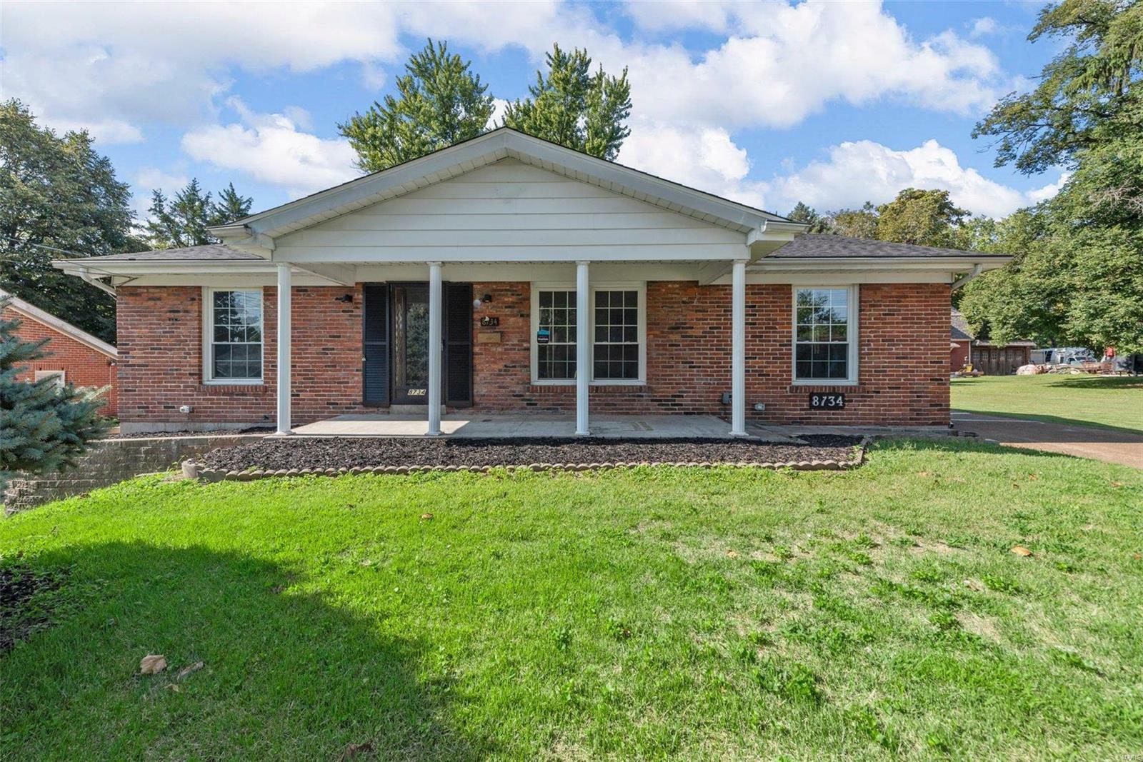 Property Photo:  8734 North Avenue  MO 63114 