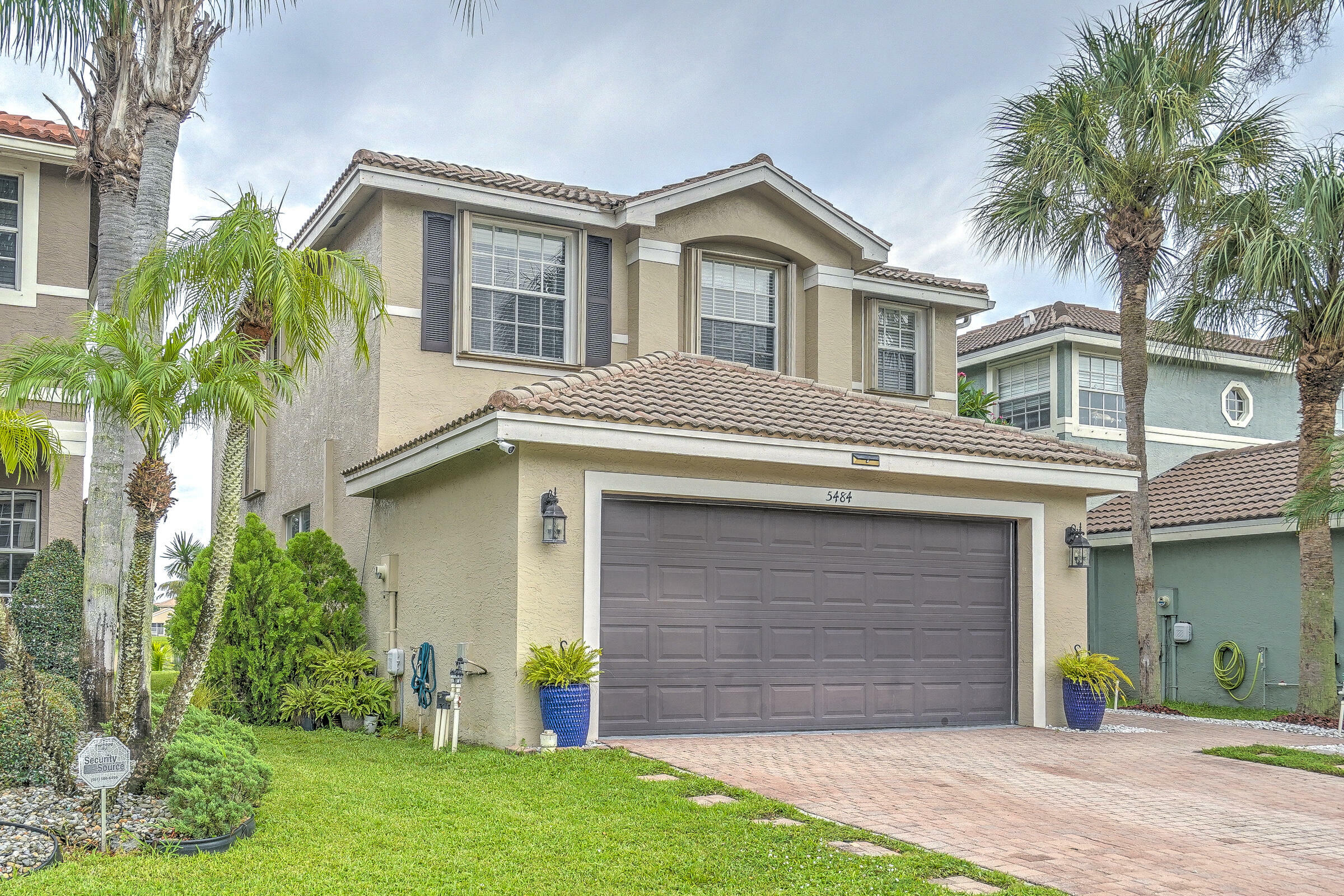 Property Photo:  5484 Queenship Court  FL 33463 