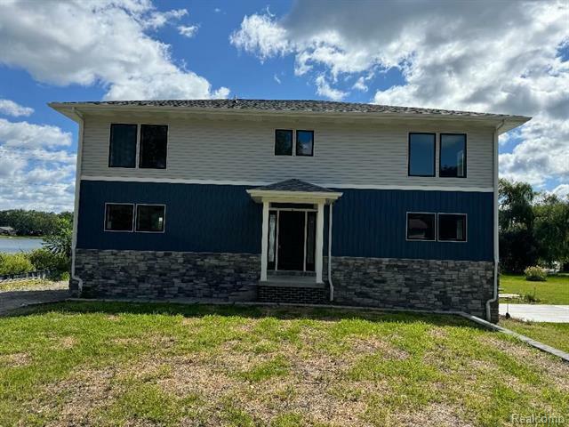 Property Photo:  5974 Carroll Lake Road  MI 48382 
