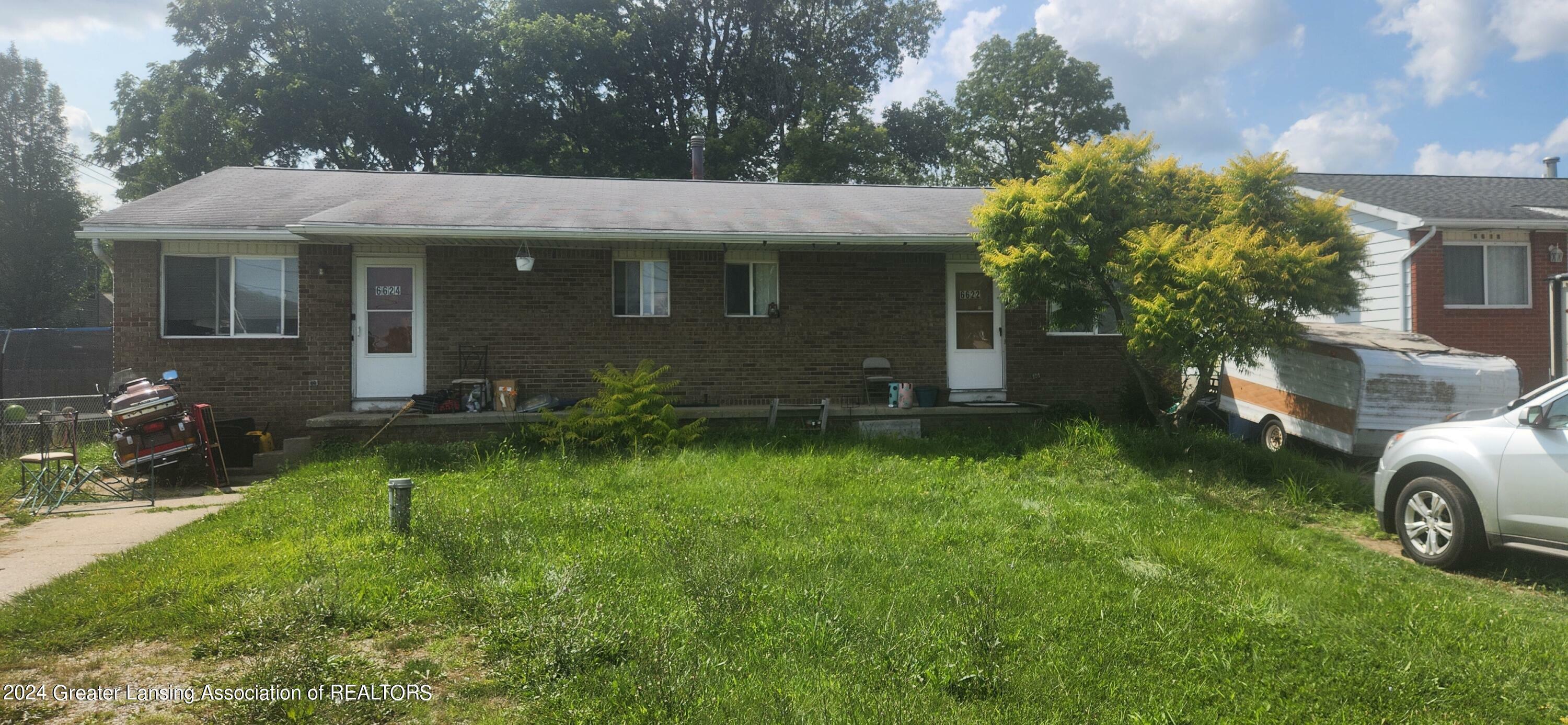 Property Photo:  6622/6624 Aurelius Road  MI 48911 