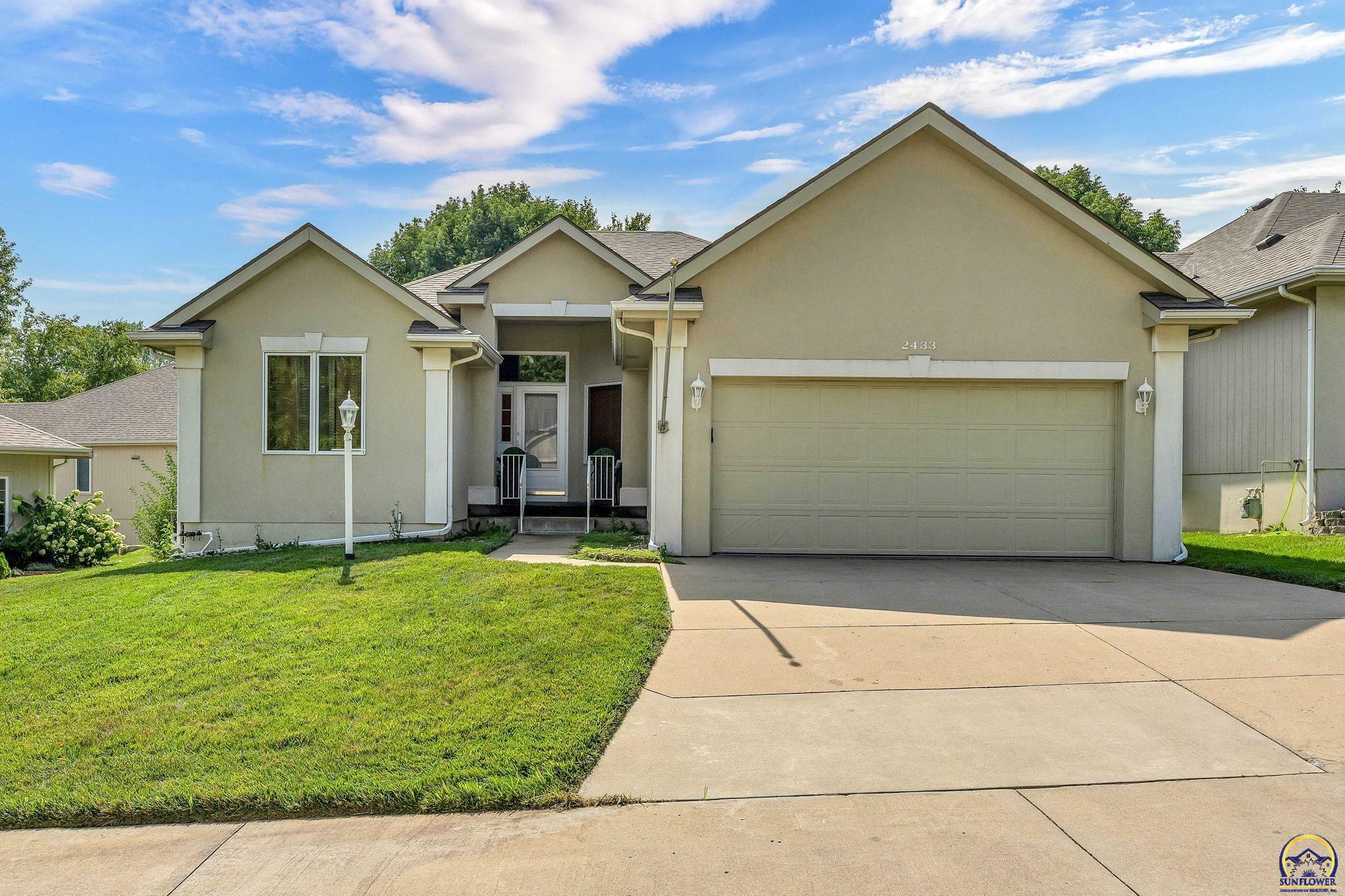 Property Photo:  2433 SW Camelot Pl  KS 66614 