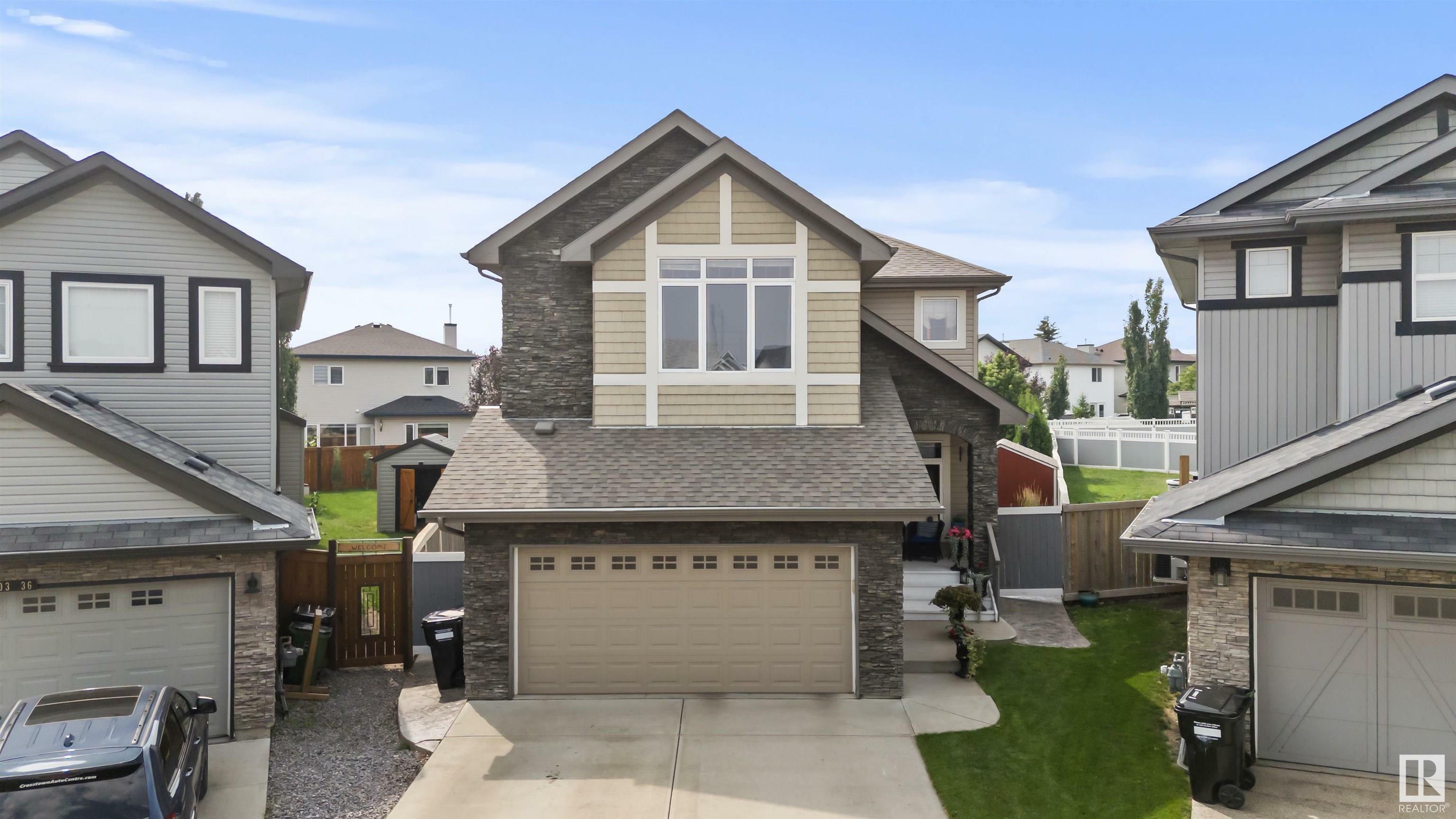 Property Photo:  16504 36 Street NW  AB T5Y 0N8 