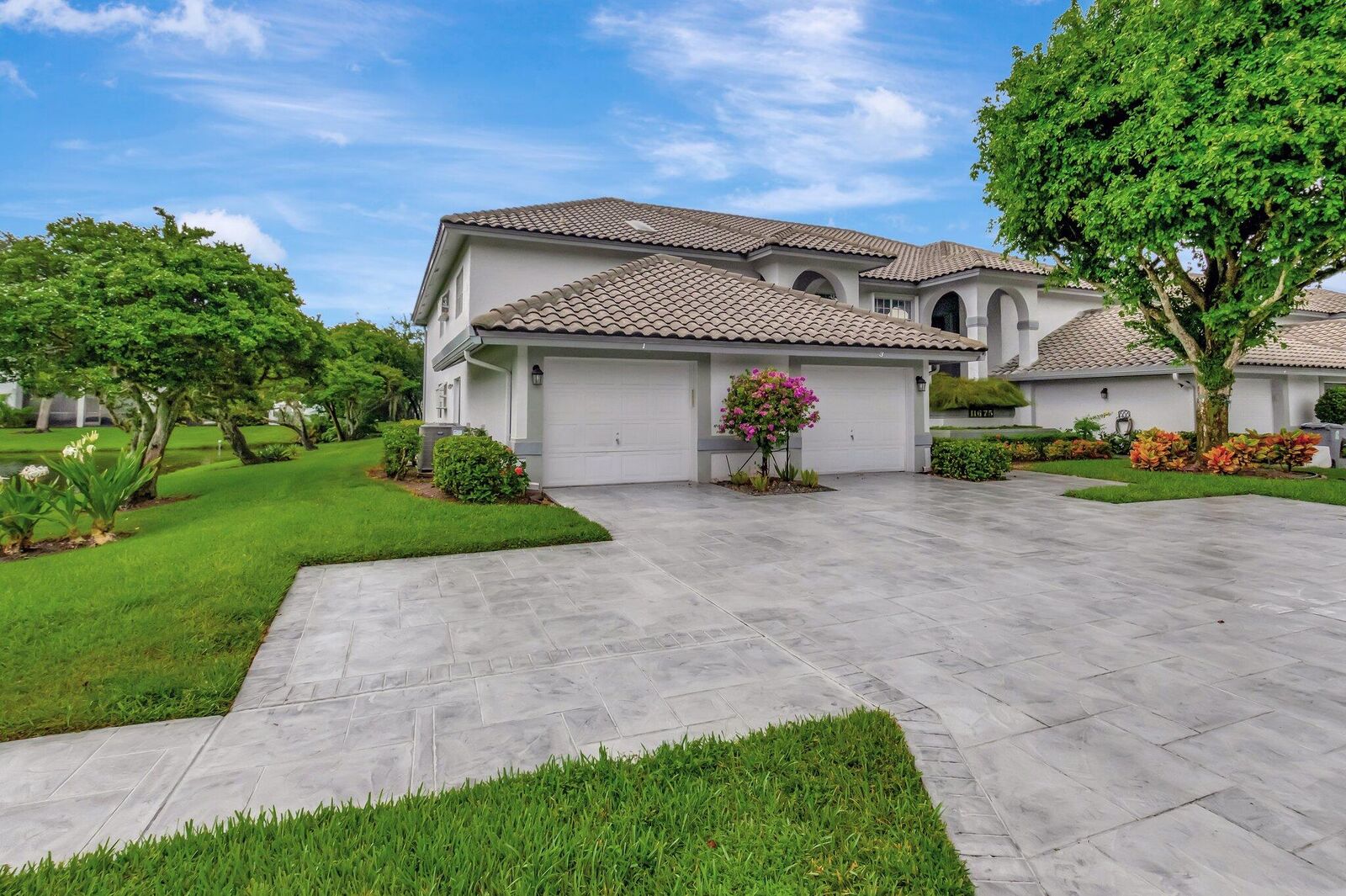 Property Photo:  11675 Briarwood Circle 1  FL 33437 