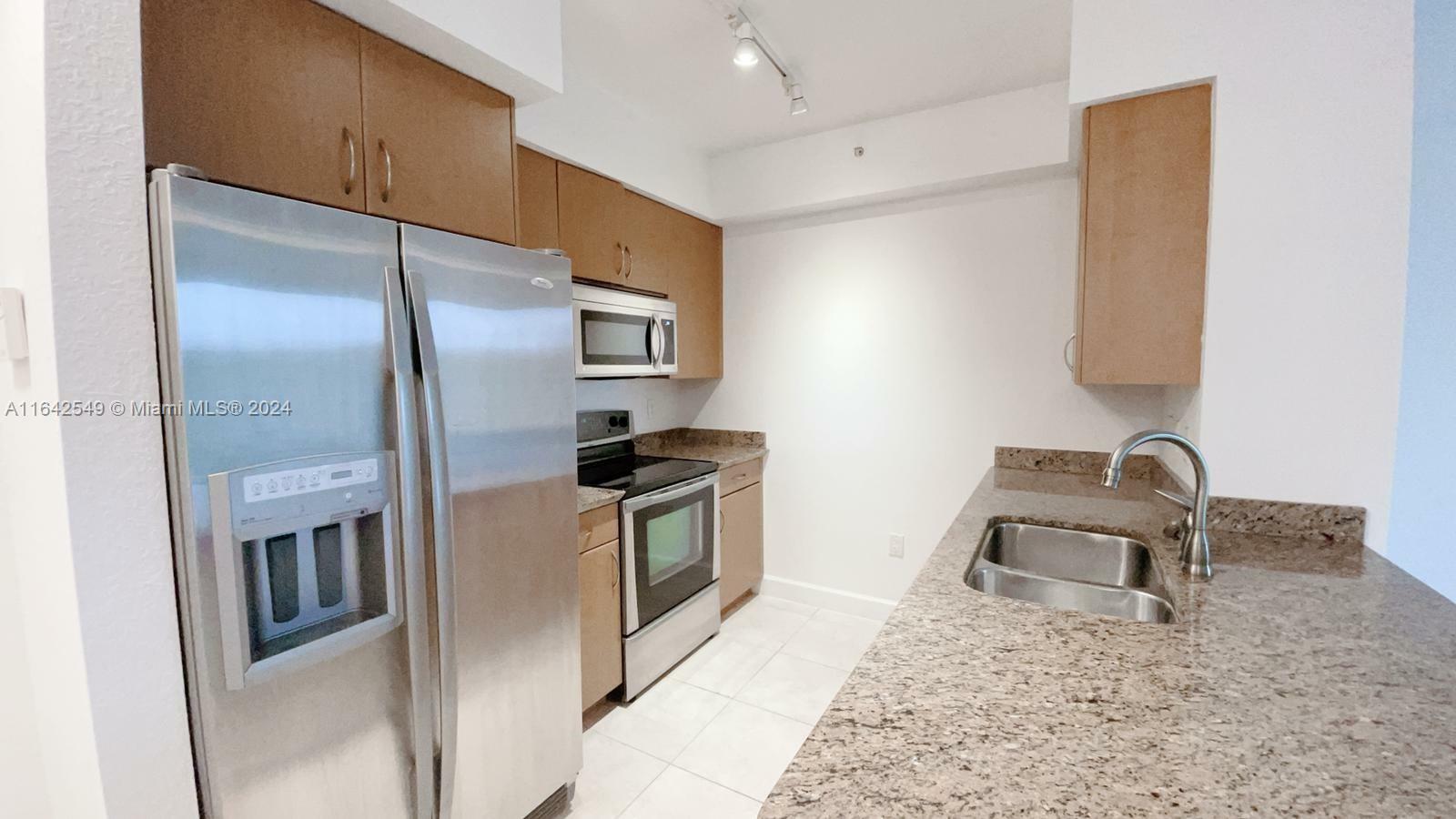 Property Photo:  1830 Radius Dr 315  FL 33020 