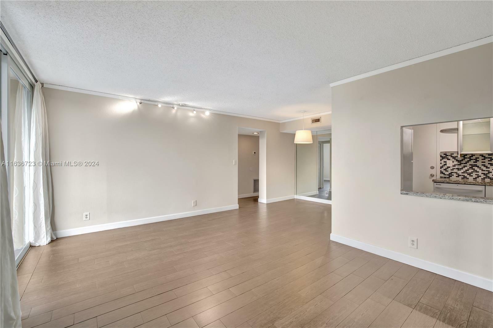 Property Photo:  1050 SE 15th St 203  FL 33316 