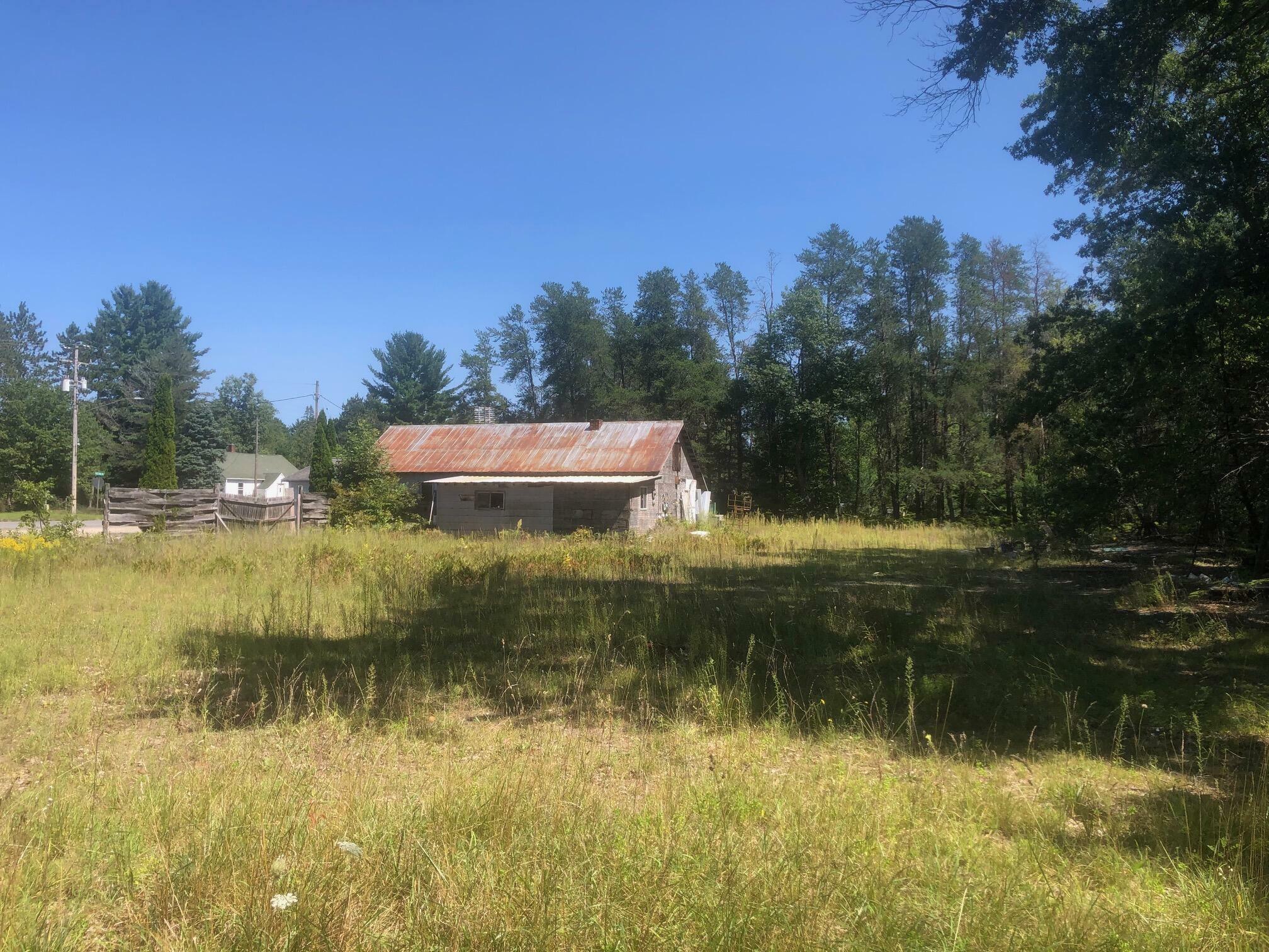 Property Photo:  14587 Nine Mile Rd  MI 49645 