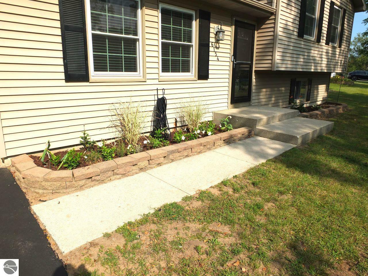 Property Photo:  6154 Lillian Lane  MI 49685 