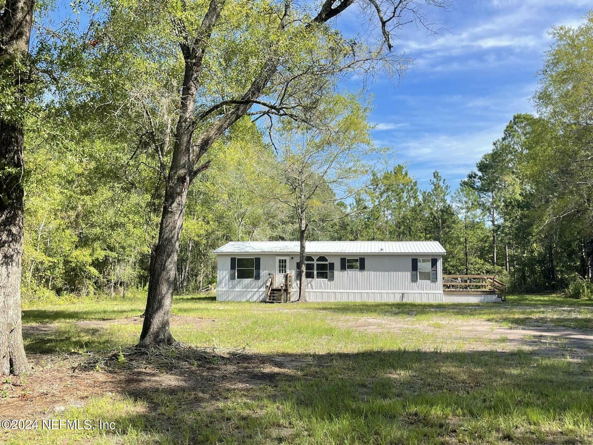 Property Photo:  833 NE 218th Street  FL 32058 