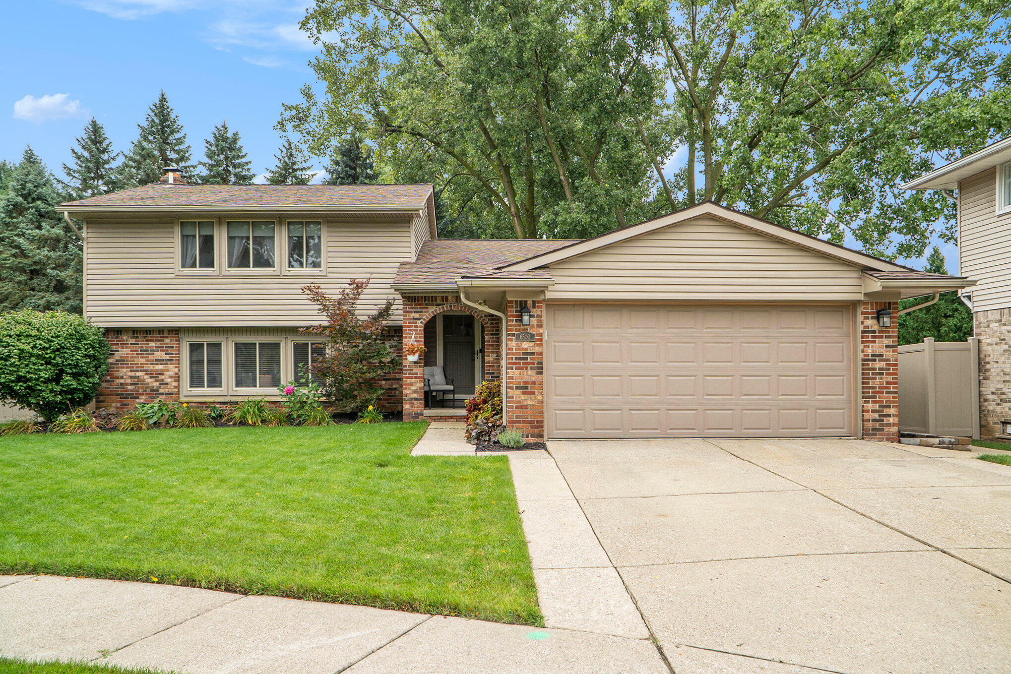 Property Photo:  6500 Raintree Court  MI 48187 