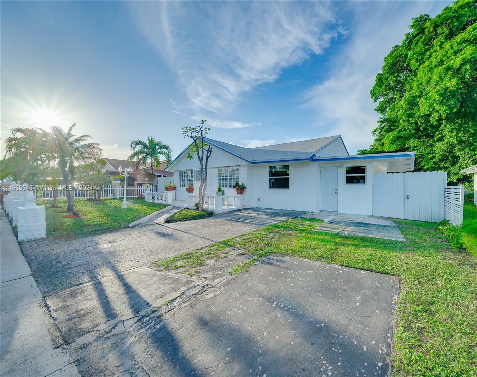 Property Photo:  725 NW 15th Ct  FL 33060 