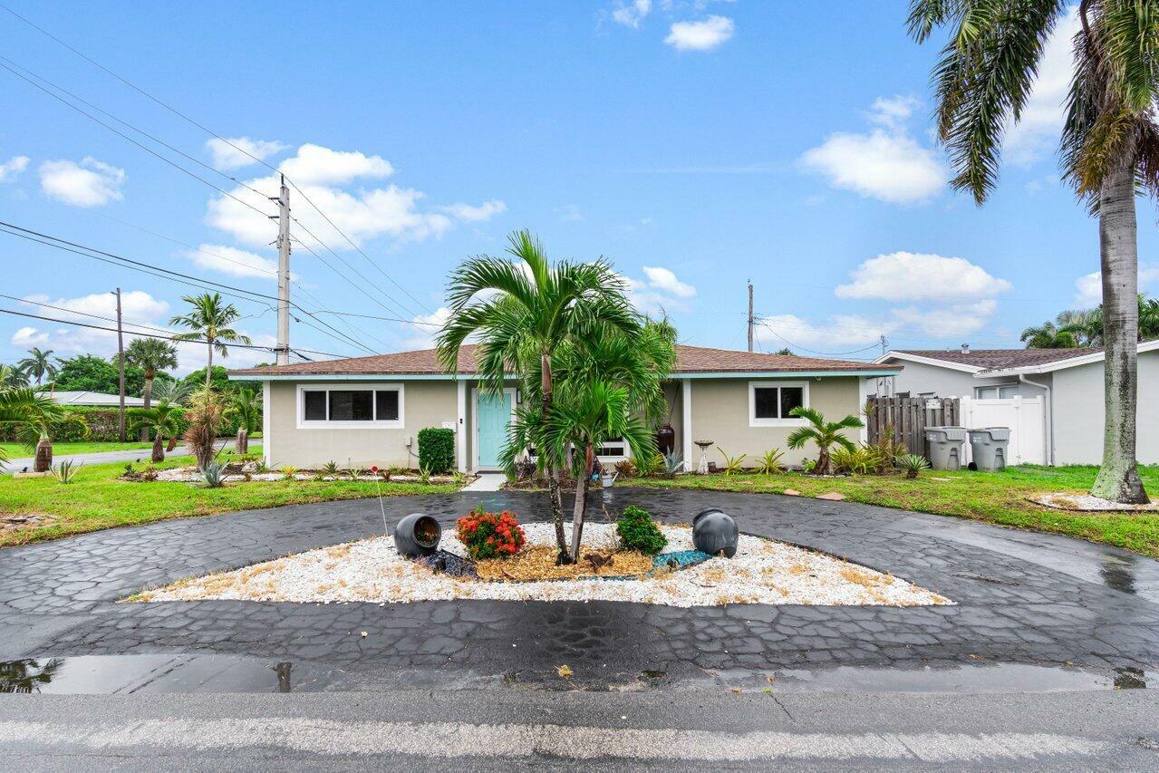 Property Photo:  712 NE 23rd Avenue  FL 33062 