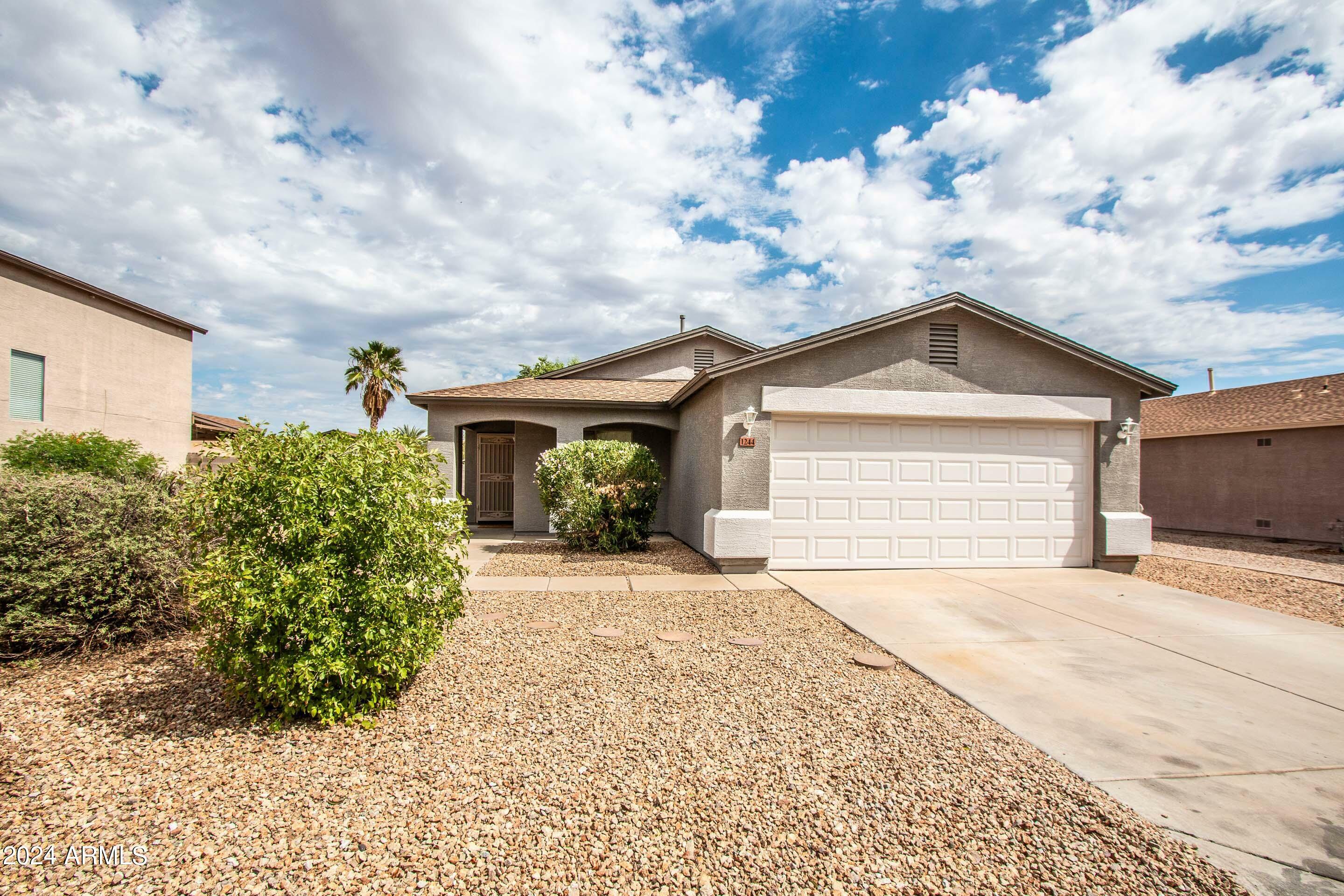 Property Photo:  1244 E Desert Rose Trail  AZ 85143 