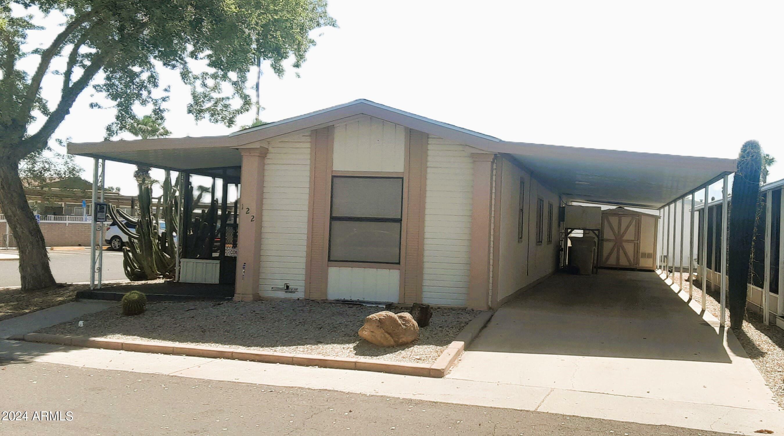 Property Photo:  10701 N 99th Avenue 122  AZ 85345 