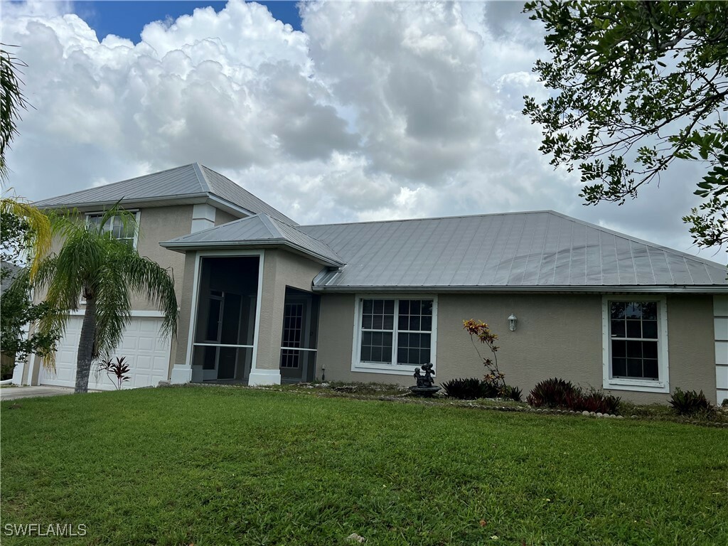 Property Photo:  3737 SW 11th Court  FL 33914 