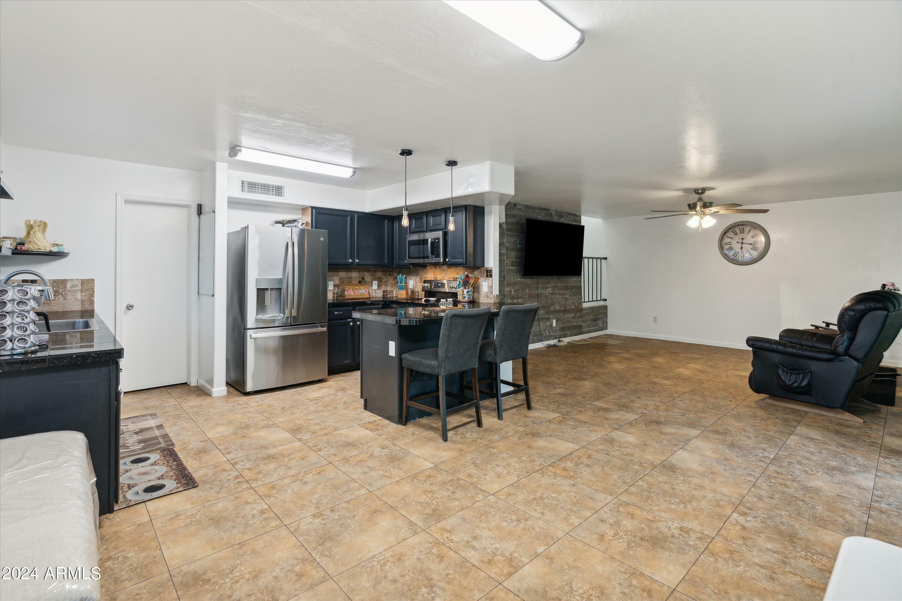 Property Photo:  1848 E Barnacle Avenue  AZ 85119 