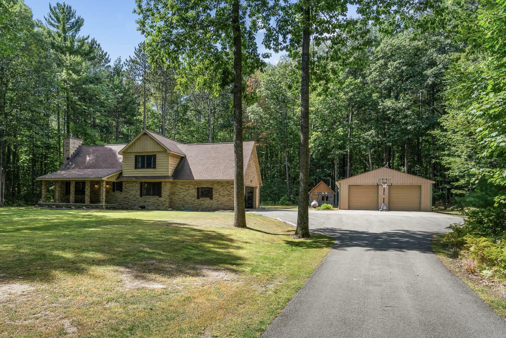 Property Photo:  410 E Indian Woods Trail  MI 49749 