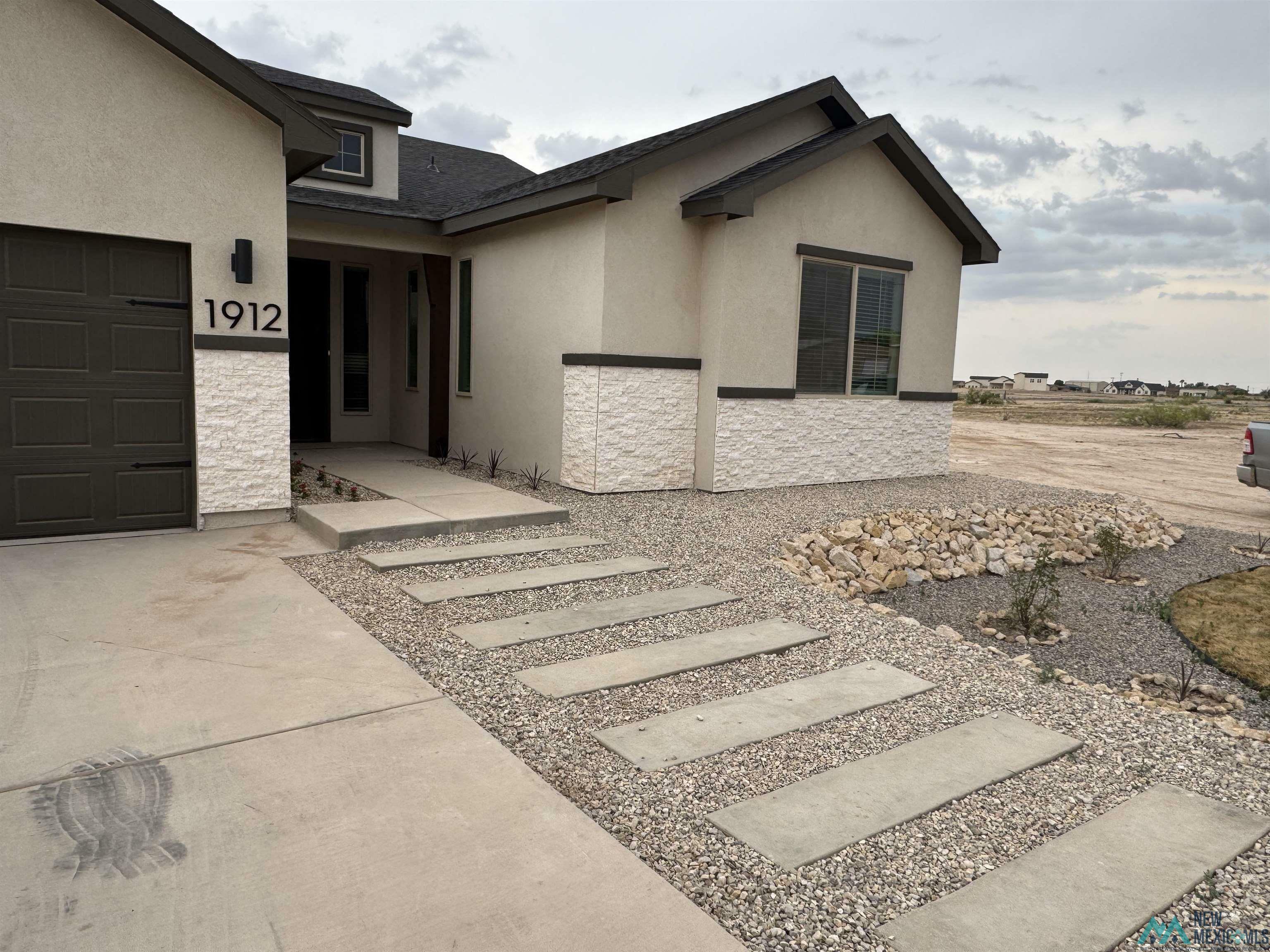 Property Photo: 1912 Savannah Drive NM 88210