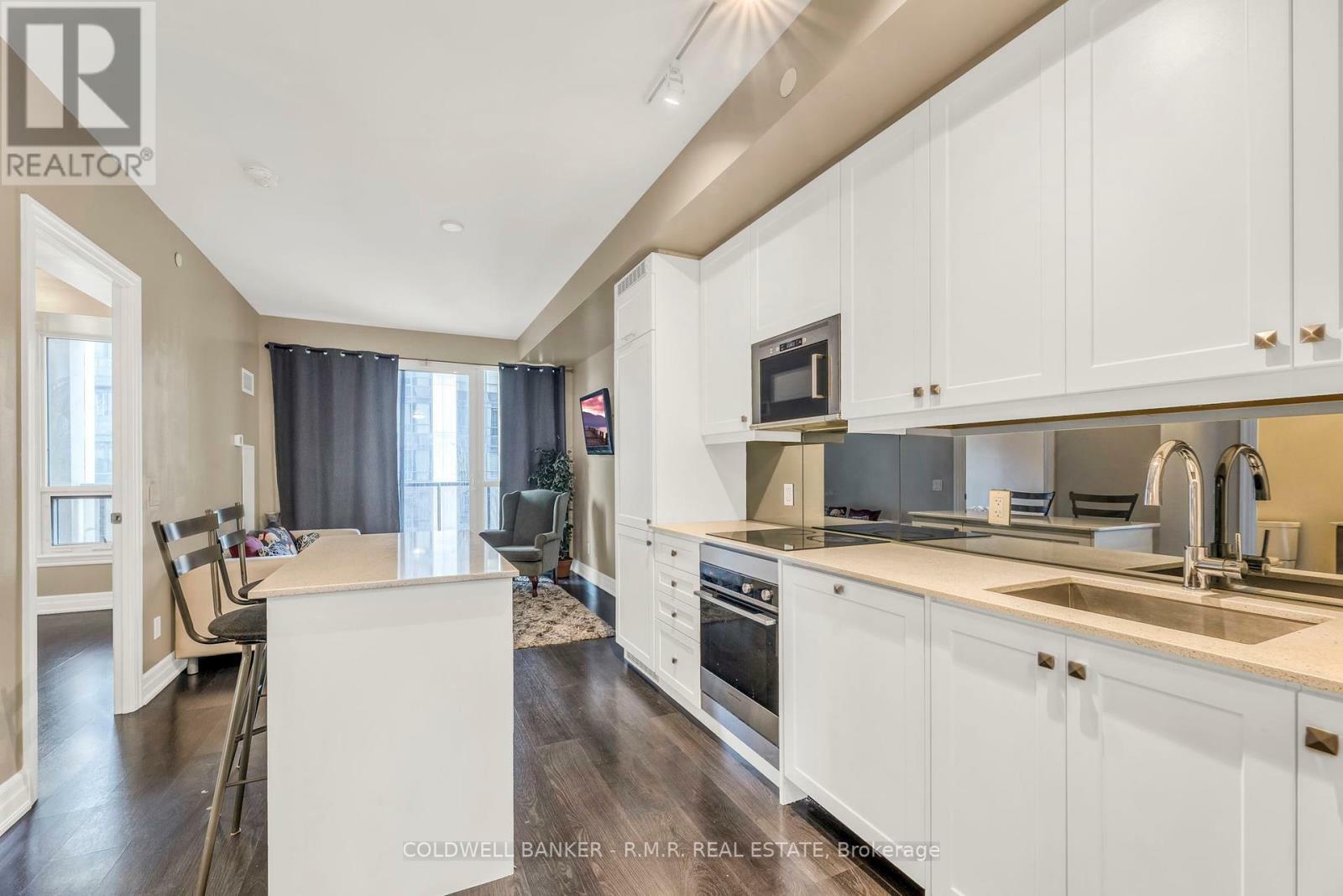 Property Photo:  9085 Jane Street 404  ON L4K 0L8 