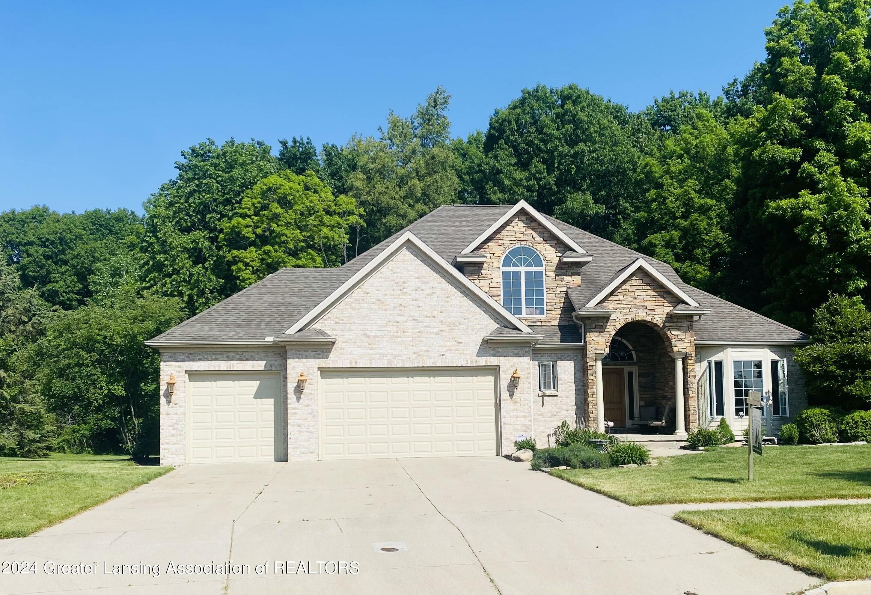 Property Photo:  4400 Chancellor Drive  MI 48820 