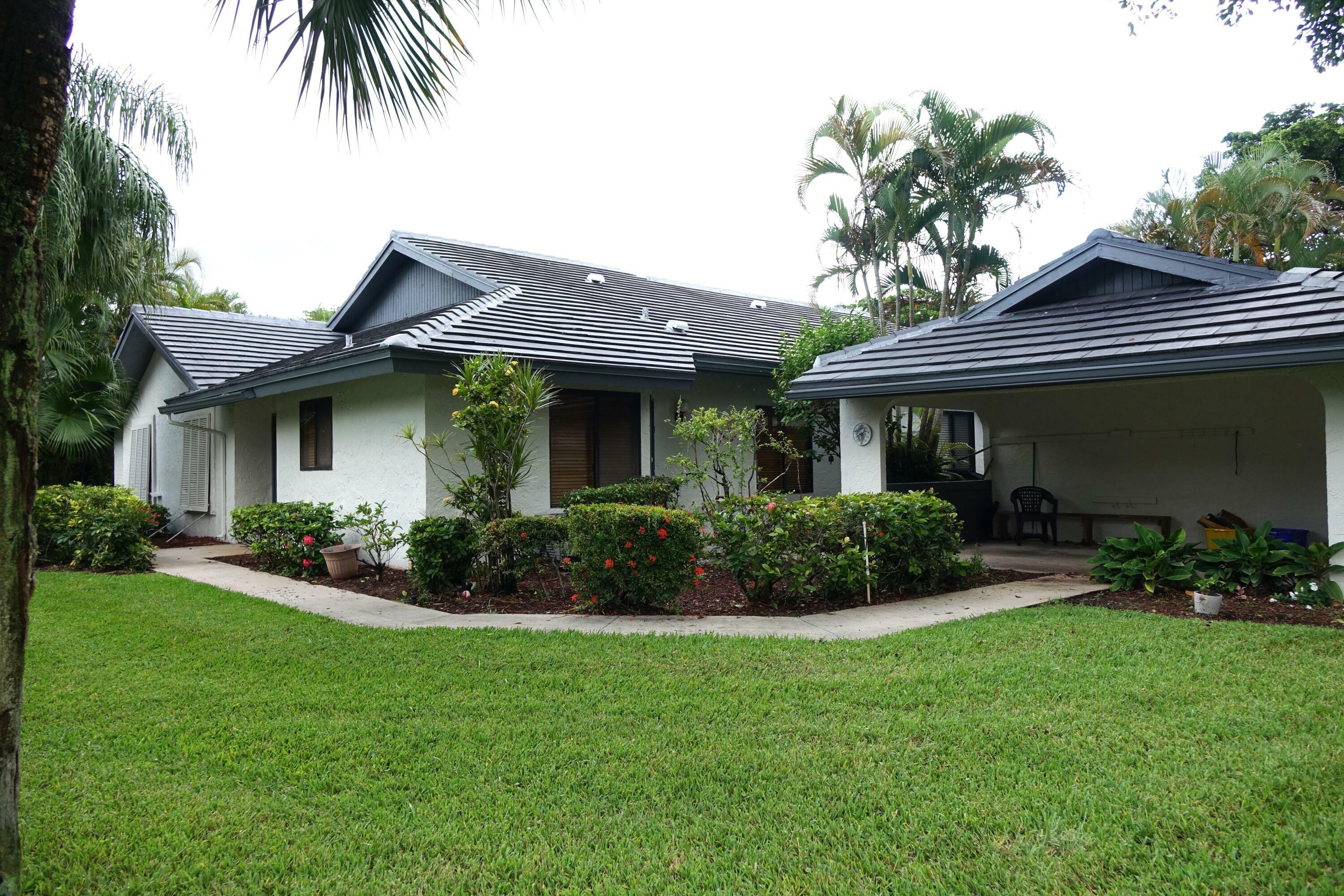 Property Photo:  10080 Hickorywood Place  FL 33437 