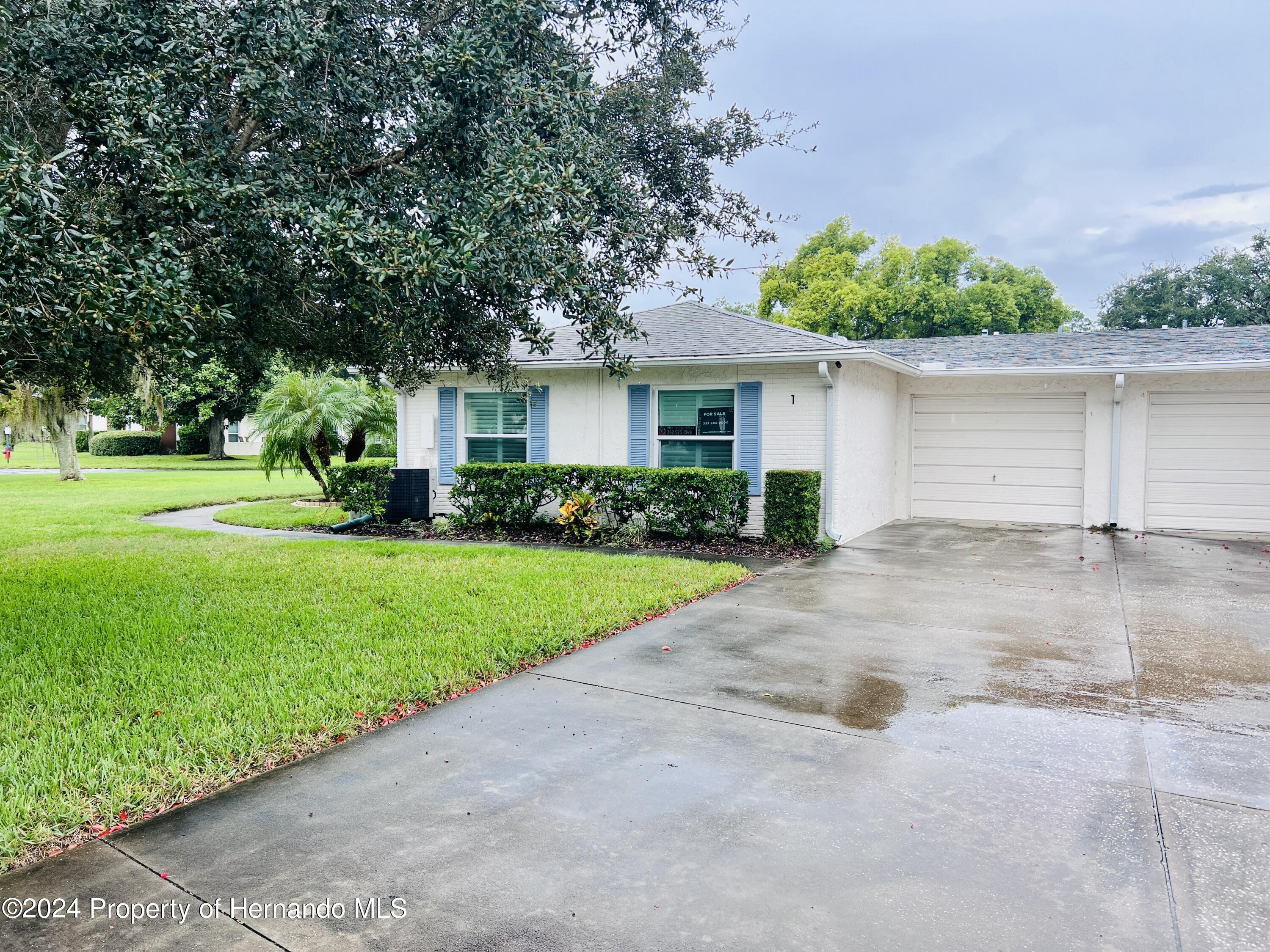Property Photo:  8141 Bugle Court #1  FL 34668 