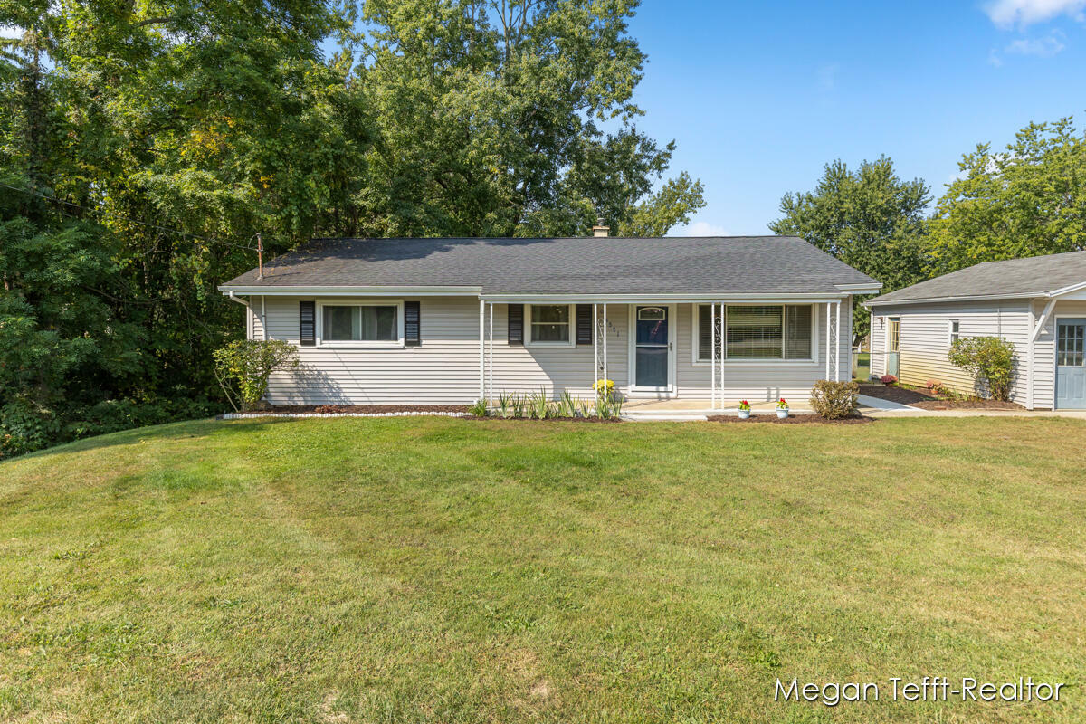 Property Photo:  13571 Woodrow Avenue NW  MI 49534 