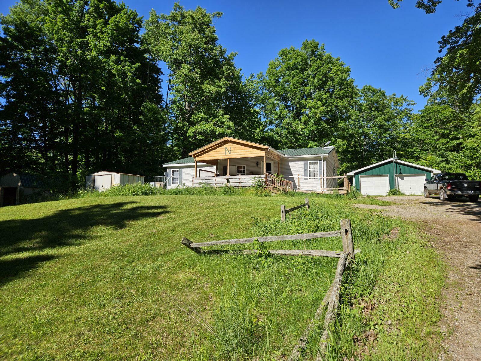 Property Photo:  14500 7 Mile Road  MI 49639 