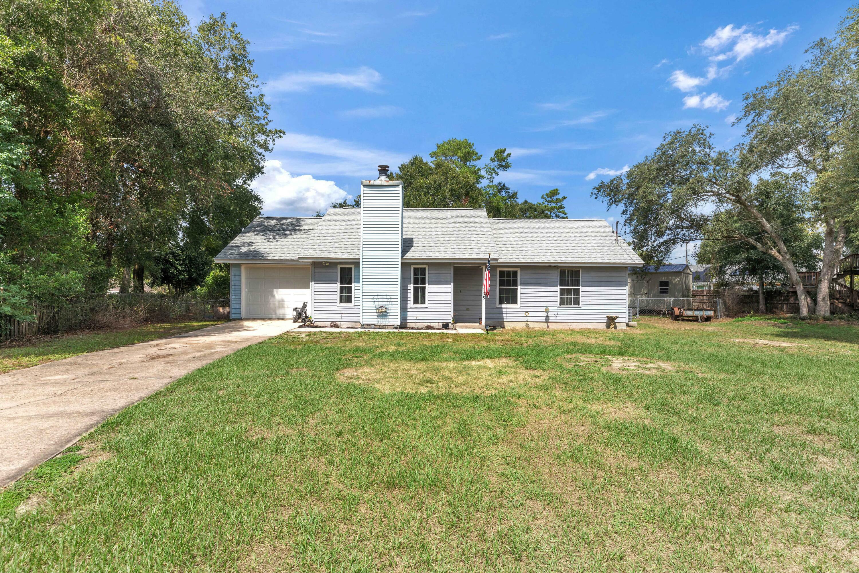 Property Photo:  105 Oakmont Drive  FL 32539 