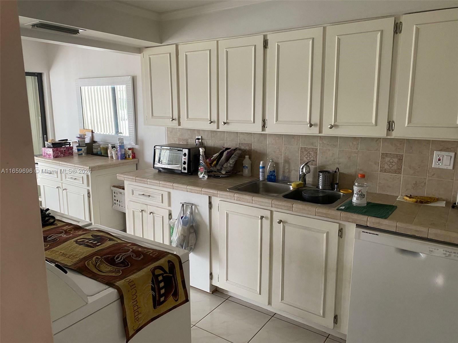 Property Photo:  1300 SW 122nd Ave 302-2  FL 33184 