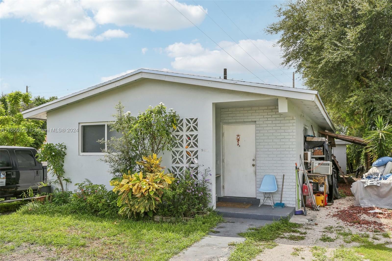 Property Photo:  2406 NW 67th St  FL 33147 