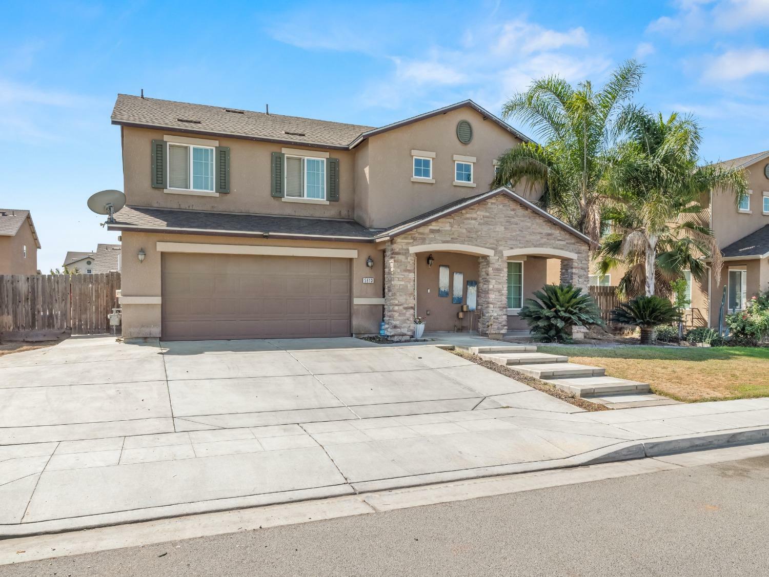 Property Photo:  5813 W Ramona Way  CA 93722 