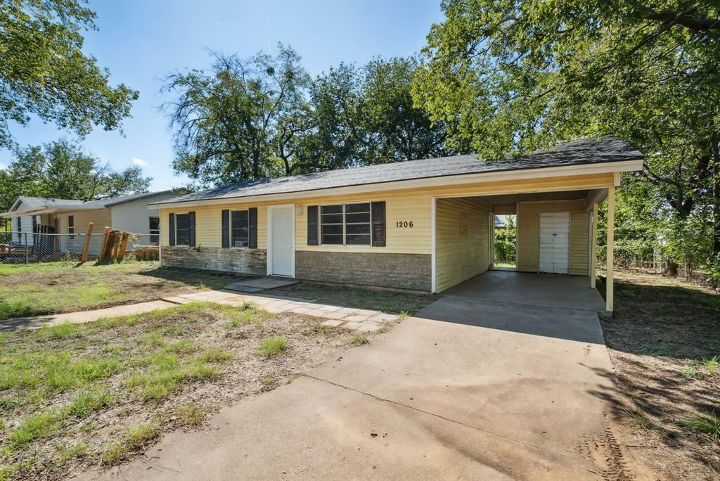 Property Photo:  1206 E SE 2nd Avenue  TX 76067 