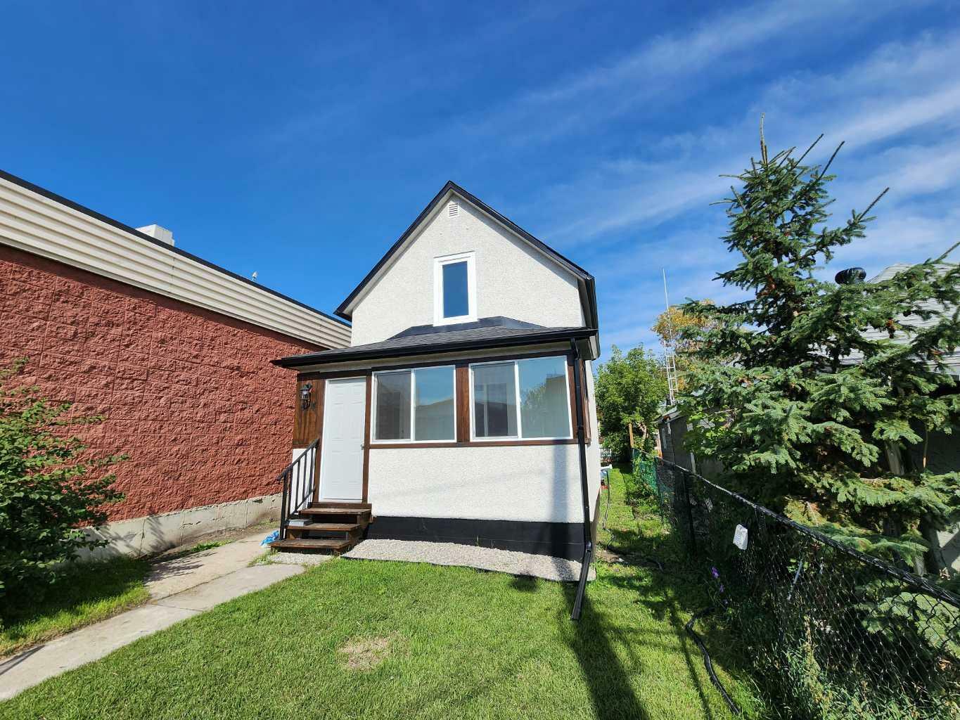 Property Photo:  814 21 Avenue SE  AB T2G 1N1 