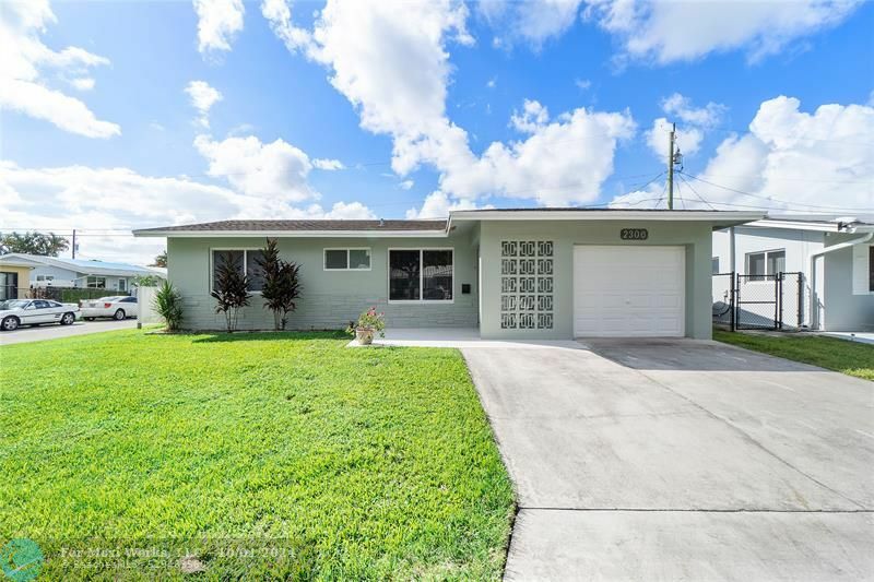 Property Photo:  2306 NW 55th St  FL 33309 