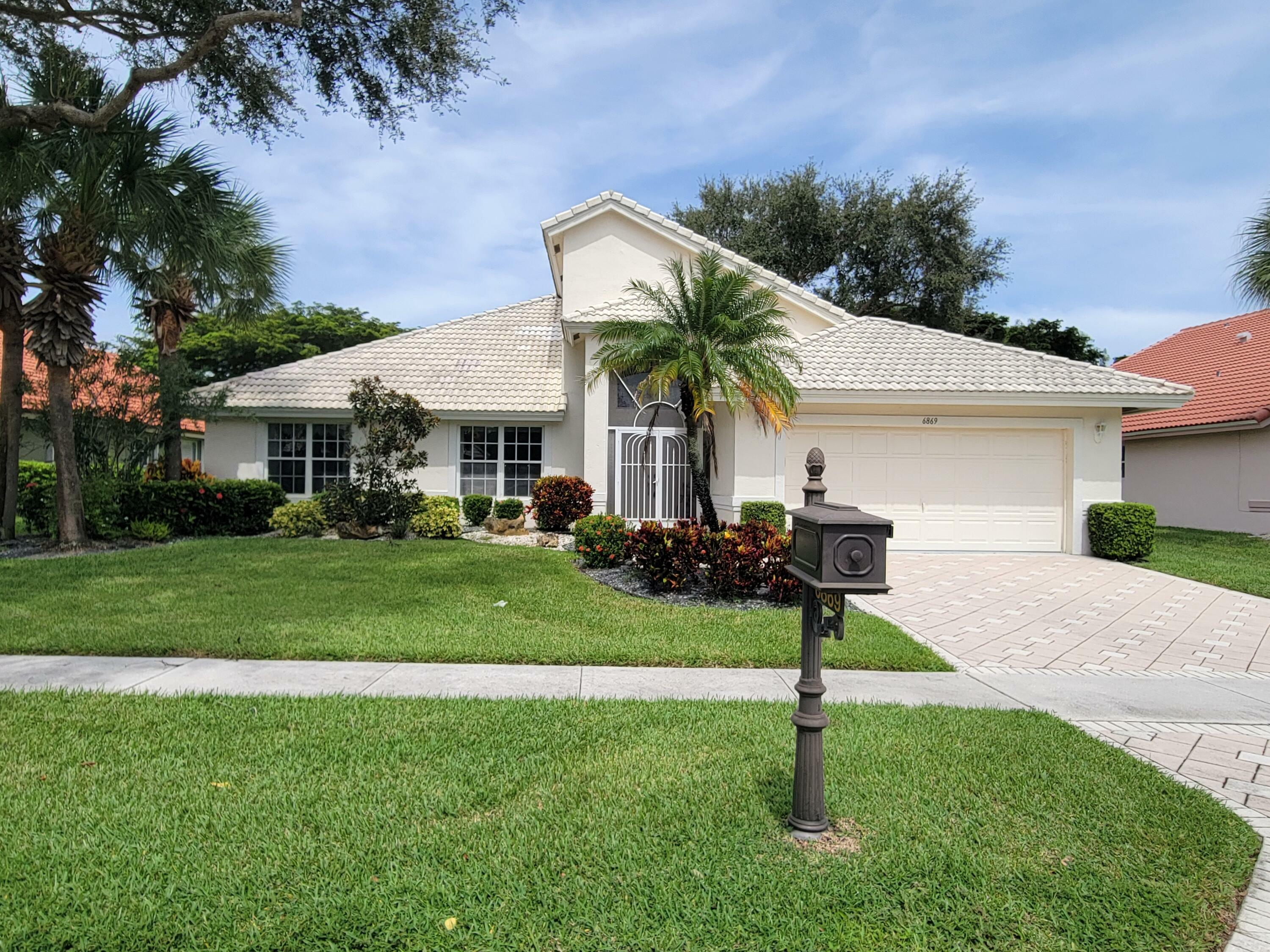 Property Photo:  6869 Sun River Road  FL 33437 