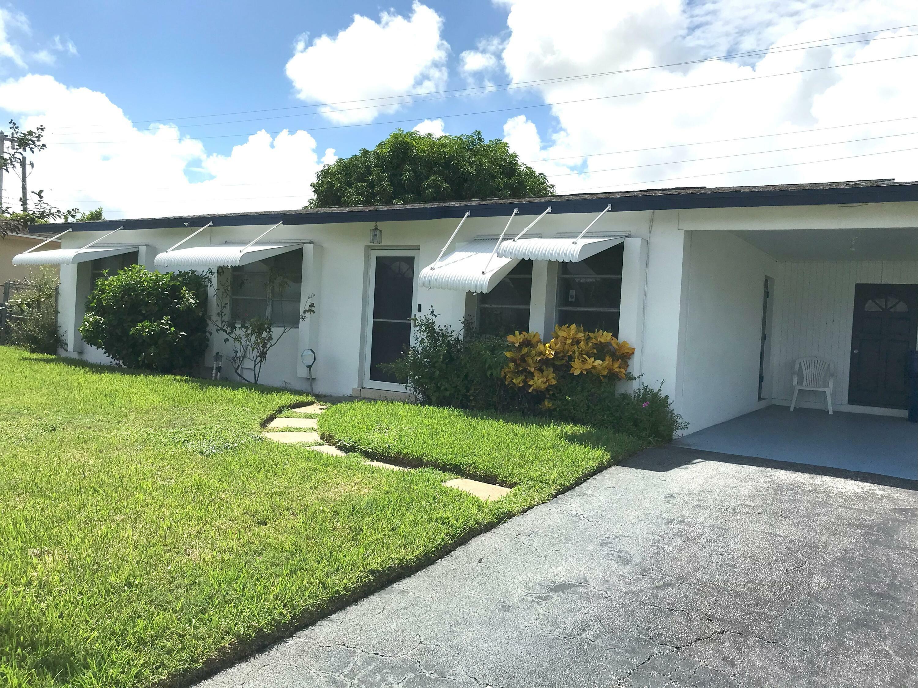 Property Photo:  1695 S 25th Court  FL 33404 