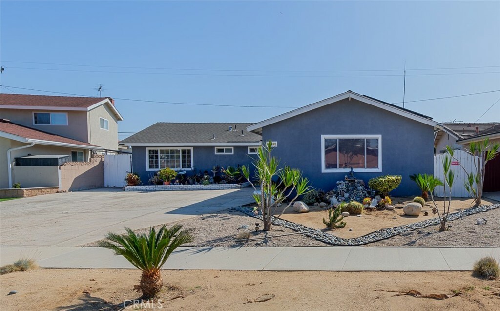 Property Photo:  10422 San Angelo Avenue  CA 92683 