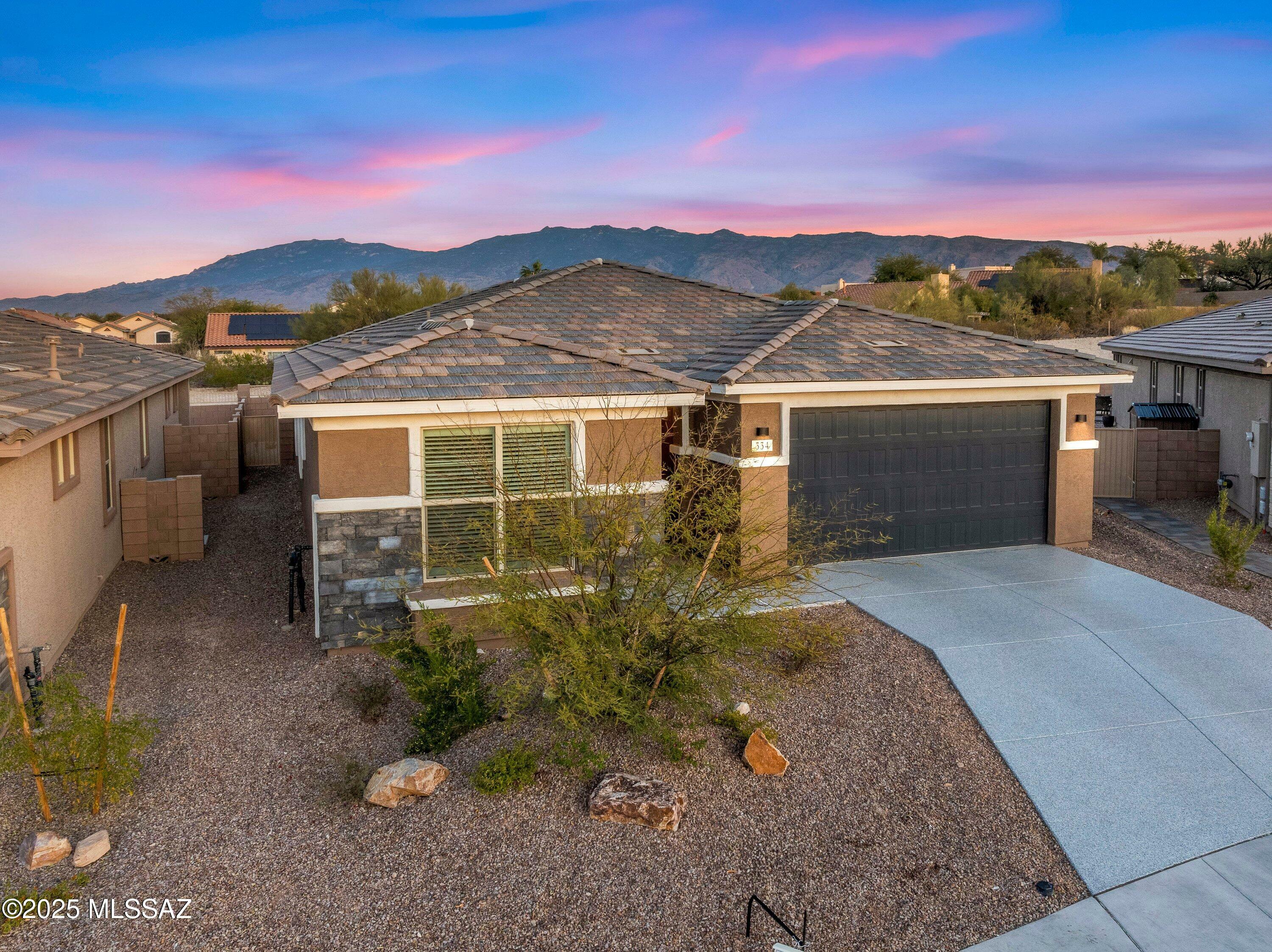 Property Photo:  334 N White Marble Avenue  AZ 85748 