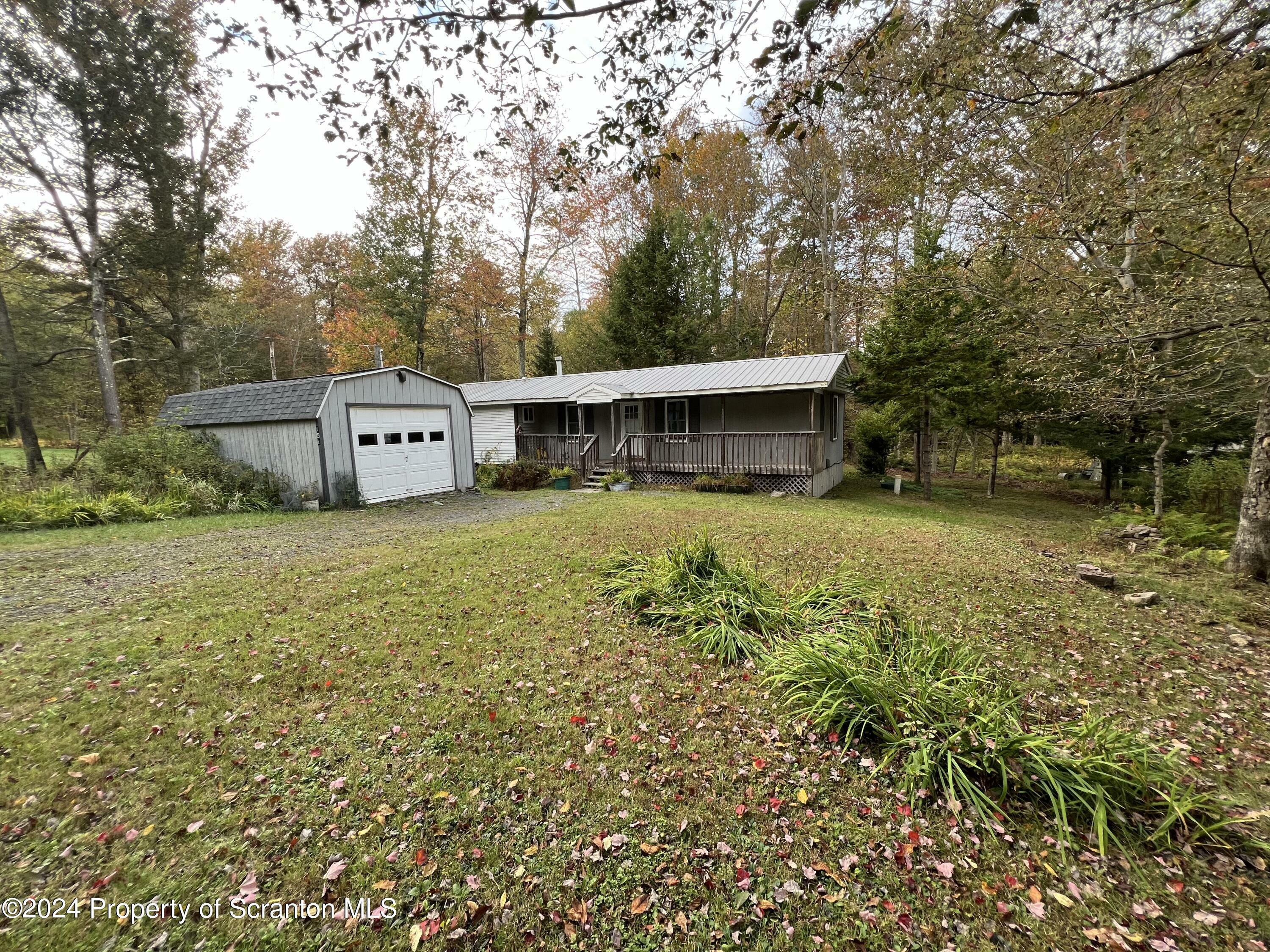 Property Photo:  141 Broken Arrow Lane  PA 18424 