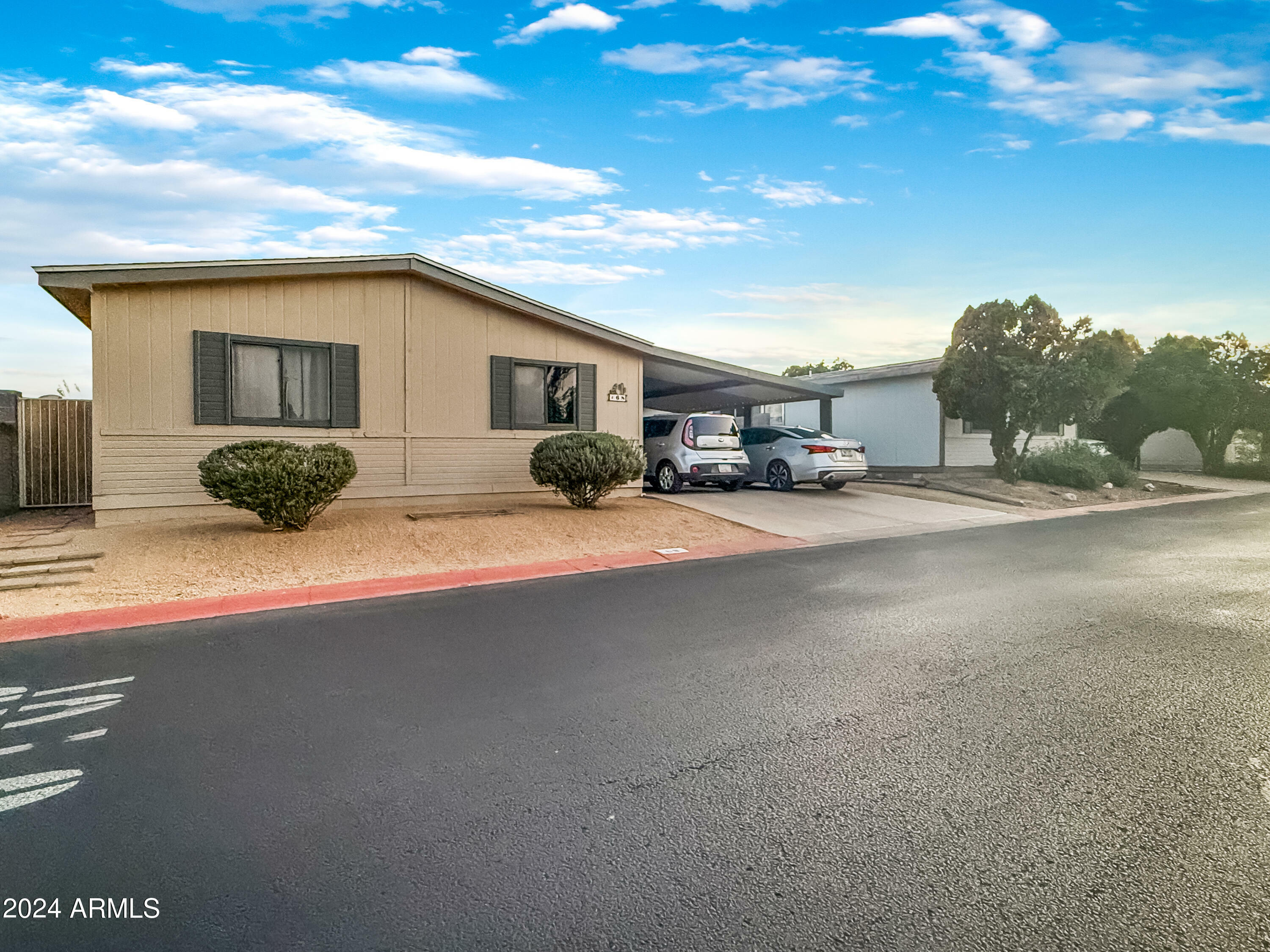 Property Photo:  8601 N 103rd Avenue 68  AZ 85345 