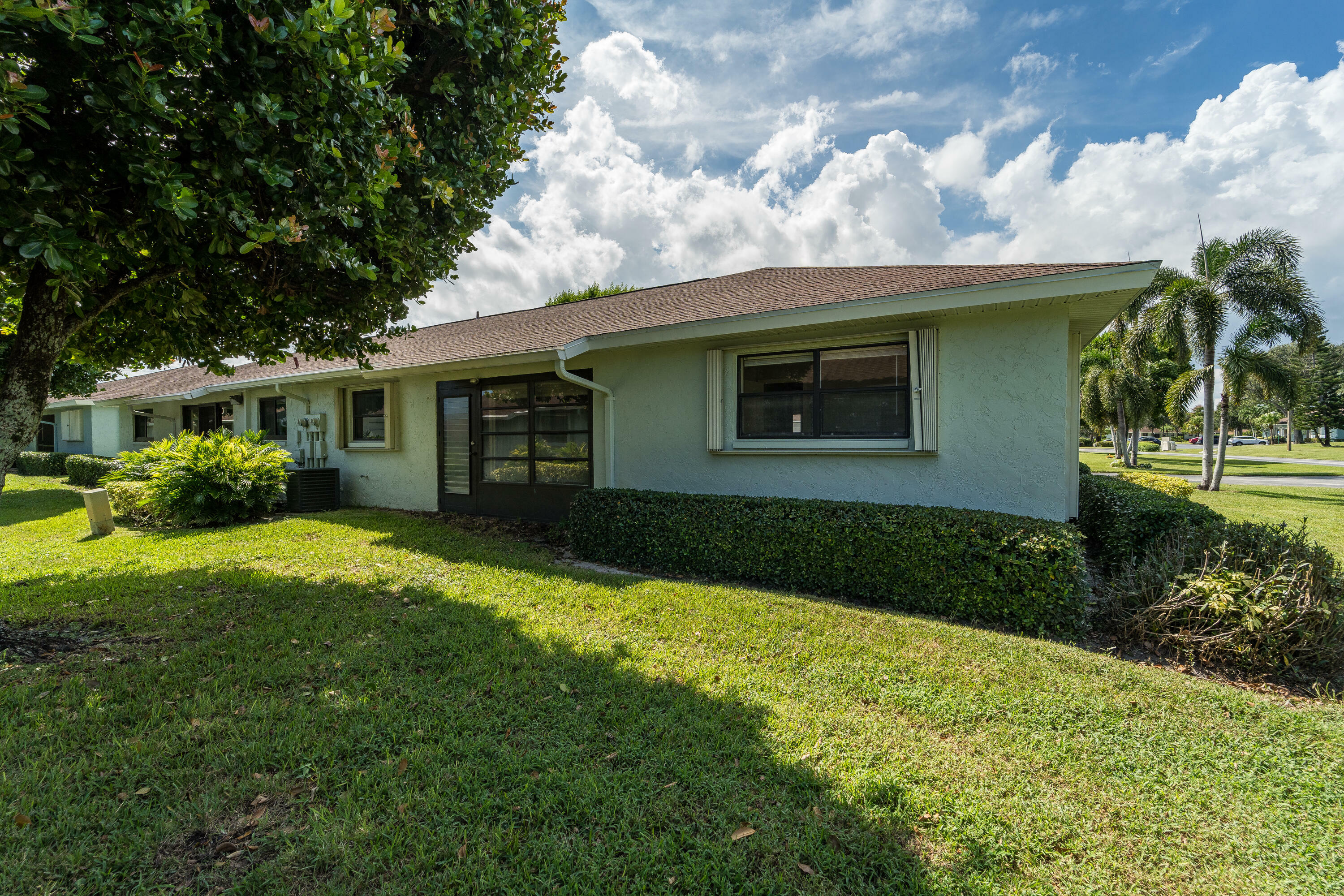 Property Photo:  9950 Ligustrum Tree Way A  FL 33436 