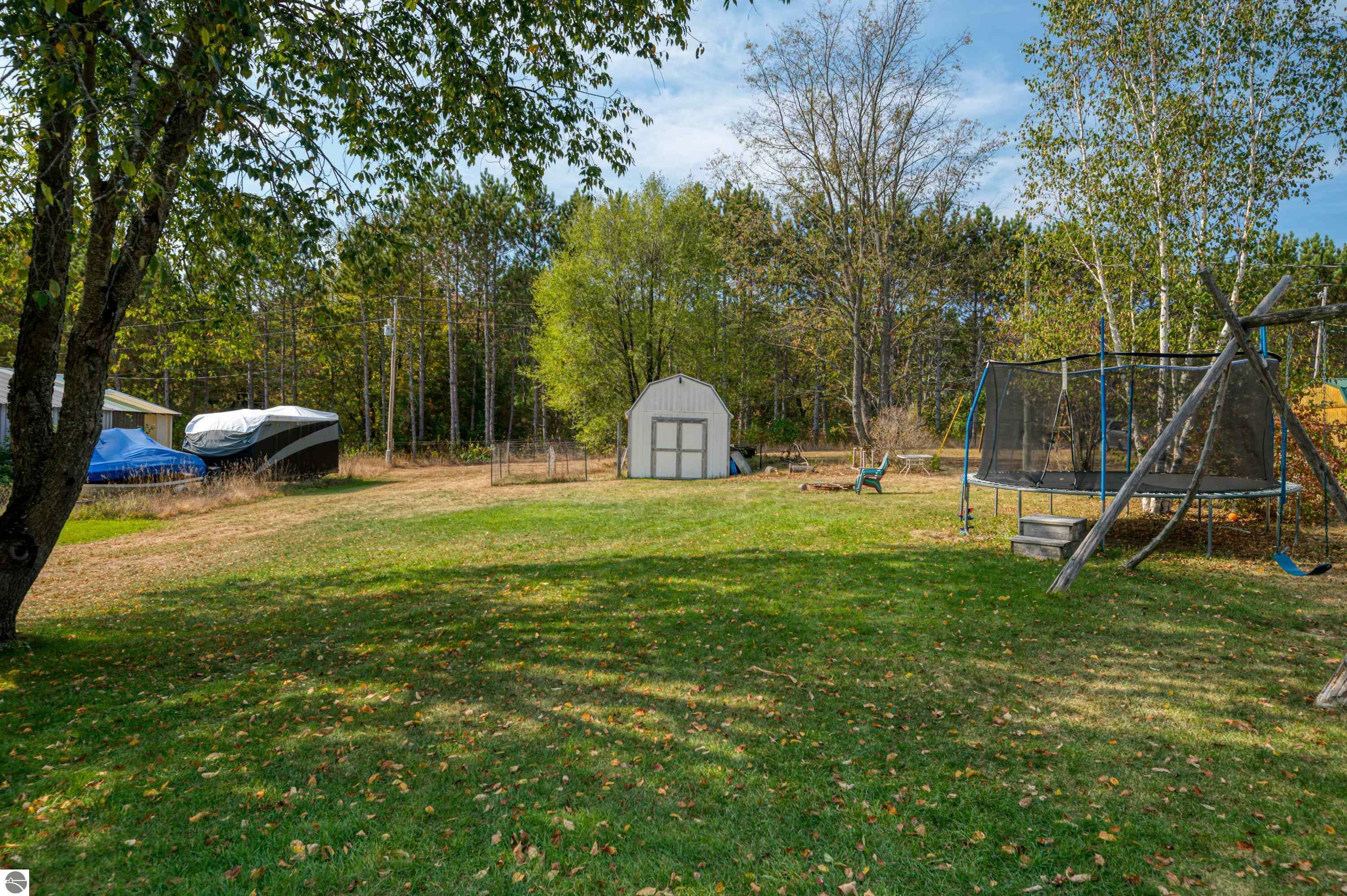 Property Photo:  6218 Sunset Drive  MI 49650 