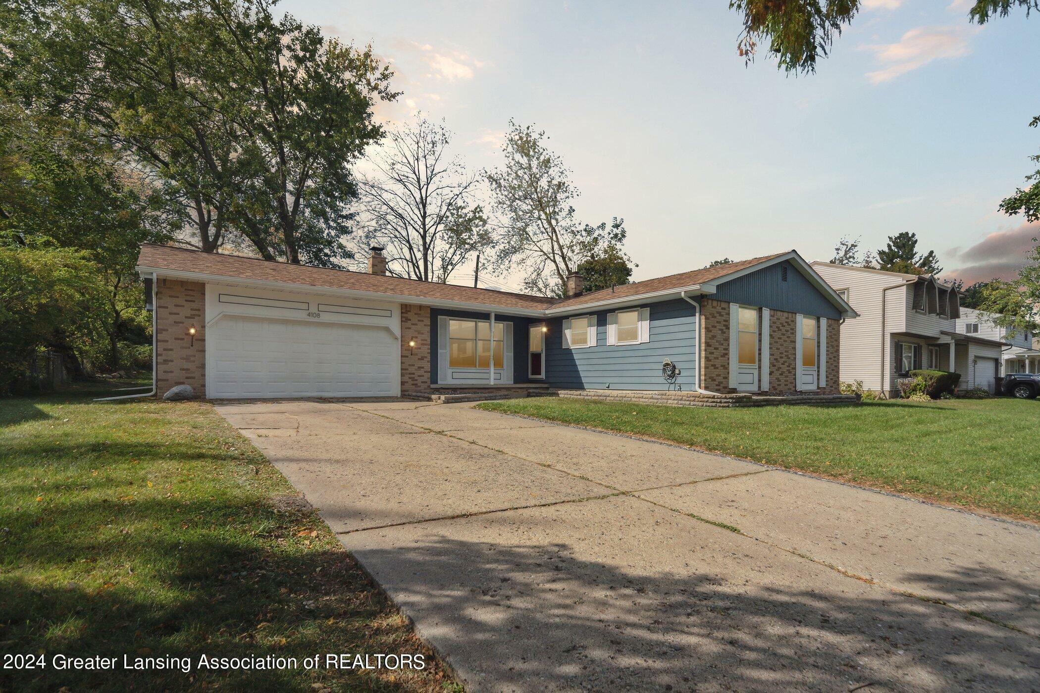 Property Photo:  4108 Walton Drive  MI 48910 